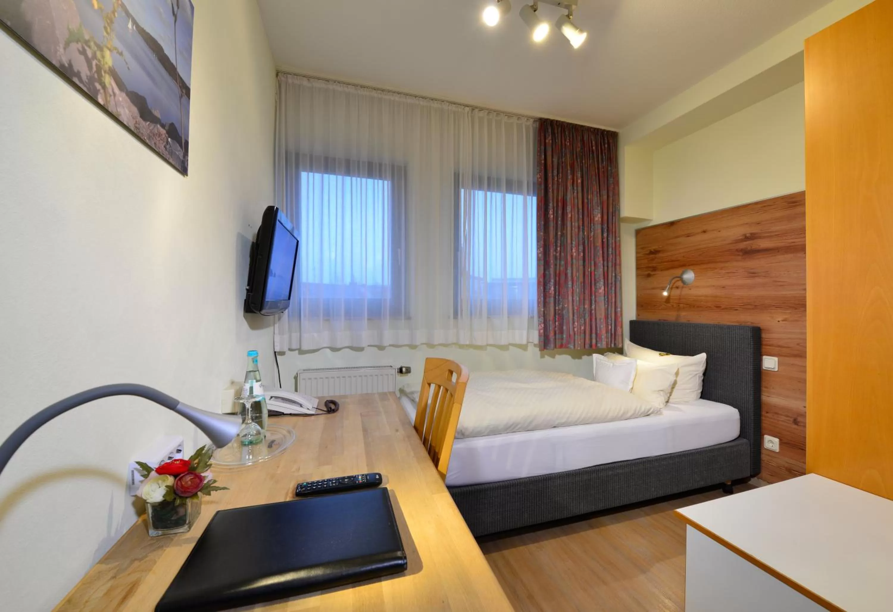 Photo of the whole room, Bed in Hotel & Wirtshaus Hansen