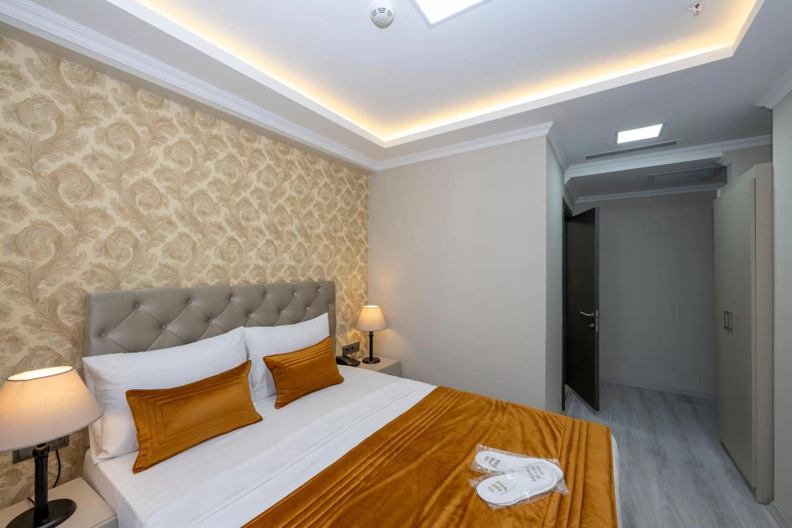 Bed in SKYSTAR DELUXE HOTEL