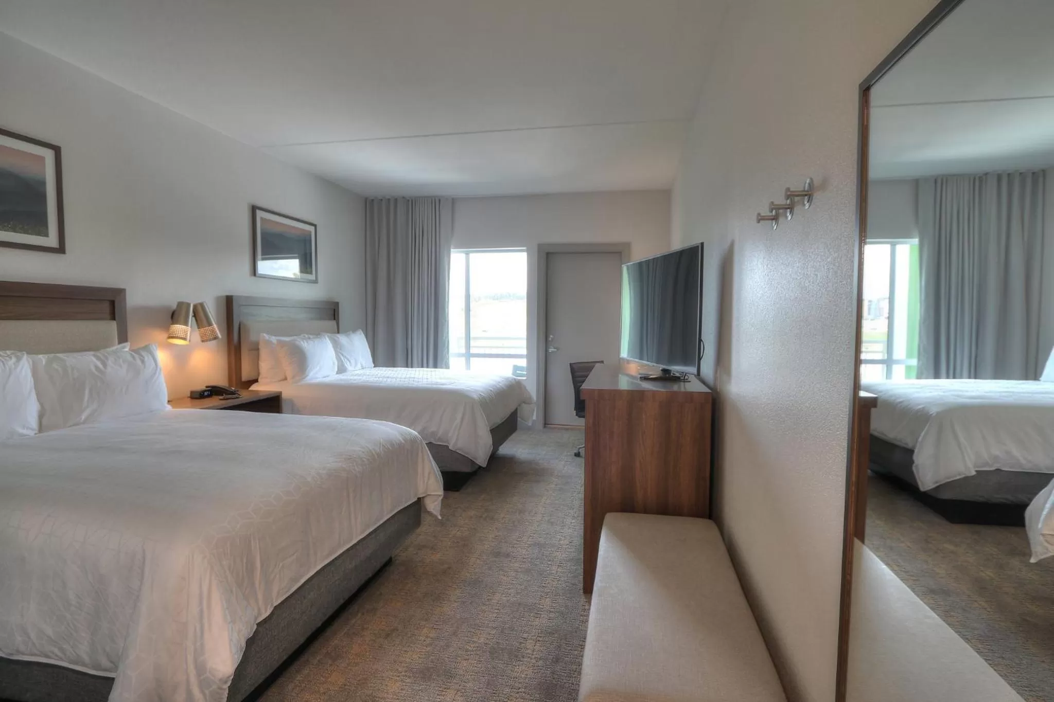 Photo of the whole room, Bed in Holiday Inn & Suites Pigeon Forge Convention Center by IHG