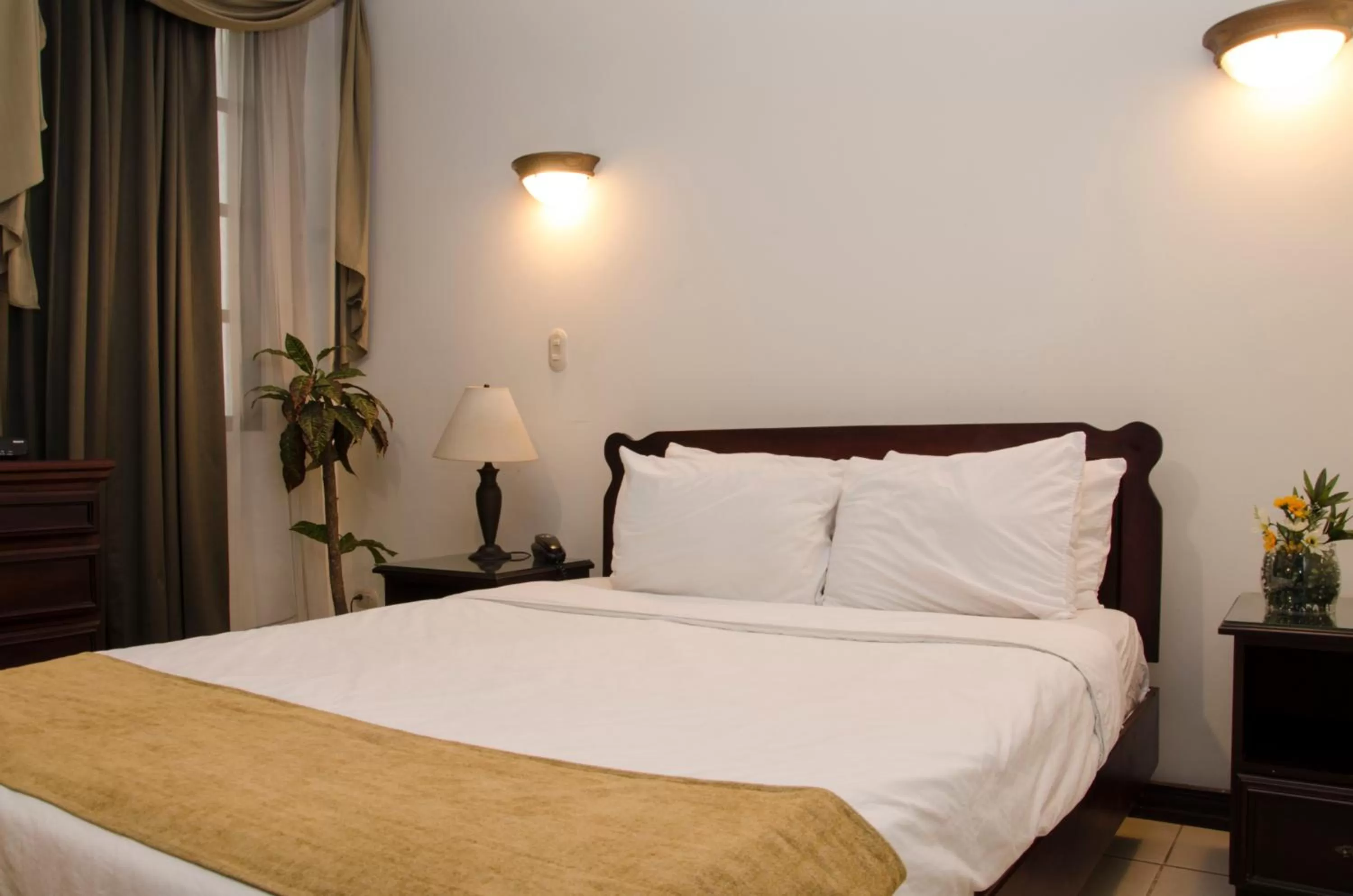 Bedroom, Bed in Hotel Plaza Real Suites & Apartments San Jose