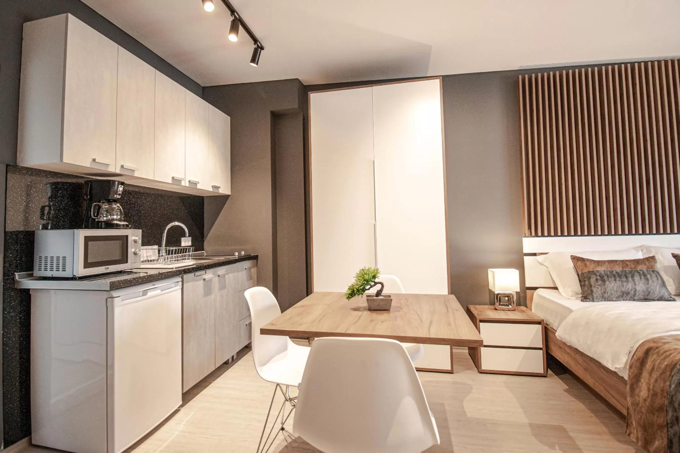 Kitchen or kitchenette in OASIS Apartments