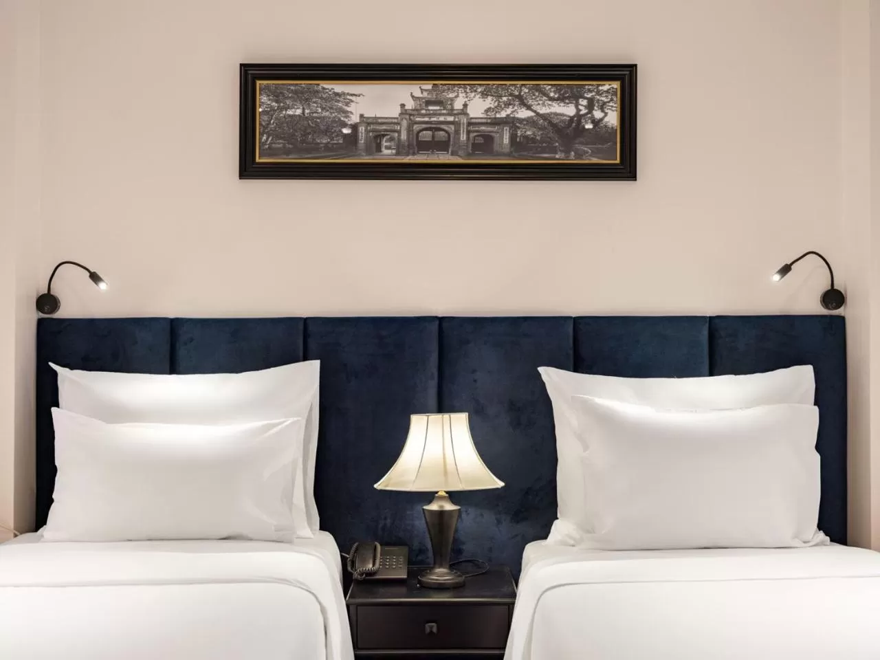 Bed in The Flower Boutique Hotel & Travel