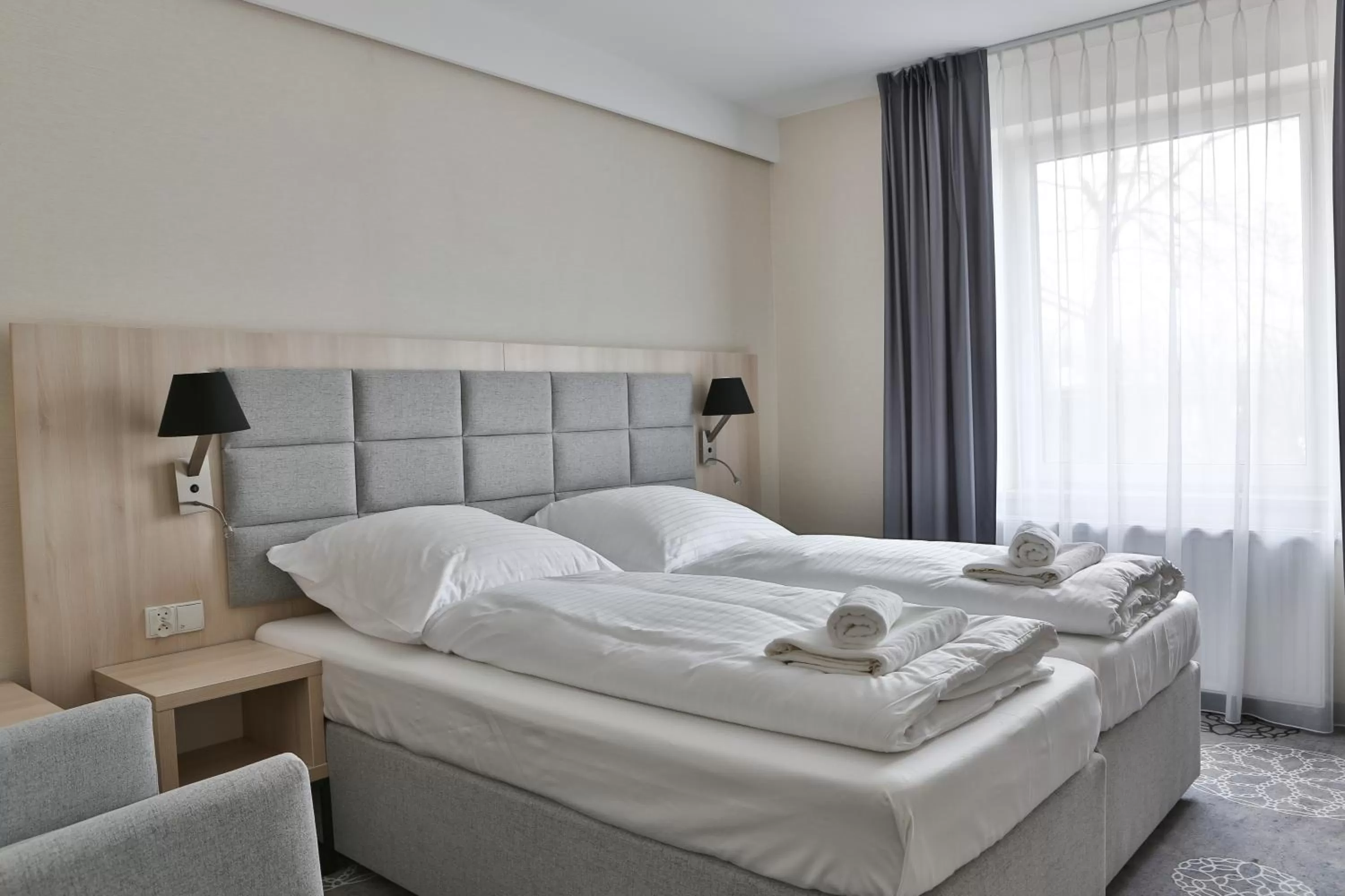 Bed in Hotel Lantier & Swimming Pool Zone