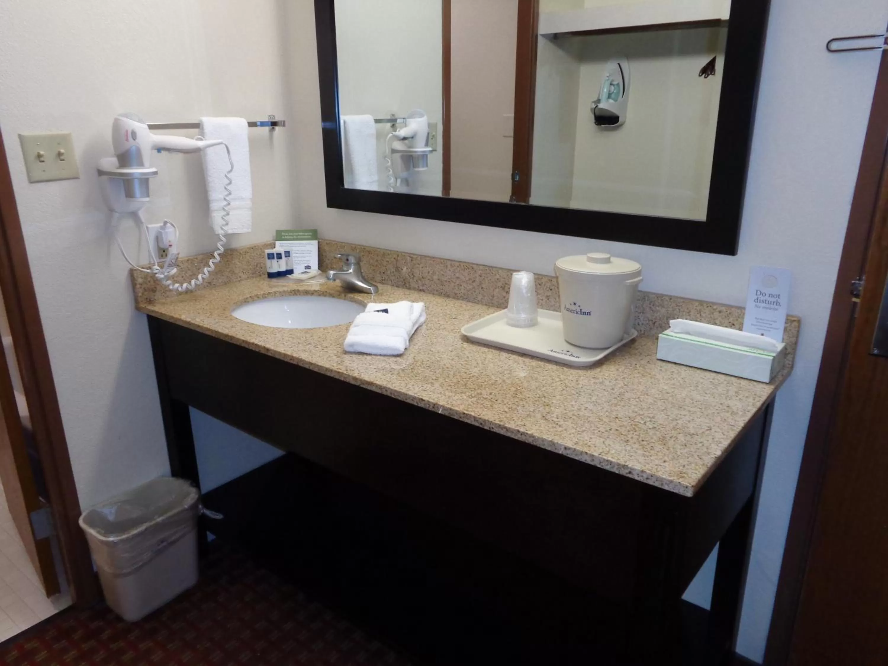 Bathroom in AmericInn by Wyndham Johnston Des Moines
