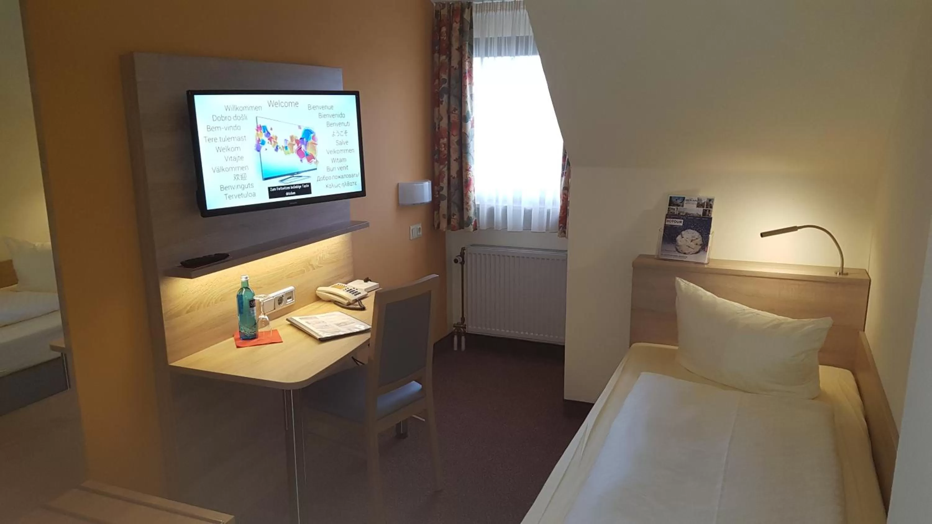 Photo of the whole room, Bed in Hotel Merian Rothenburg