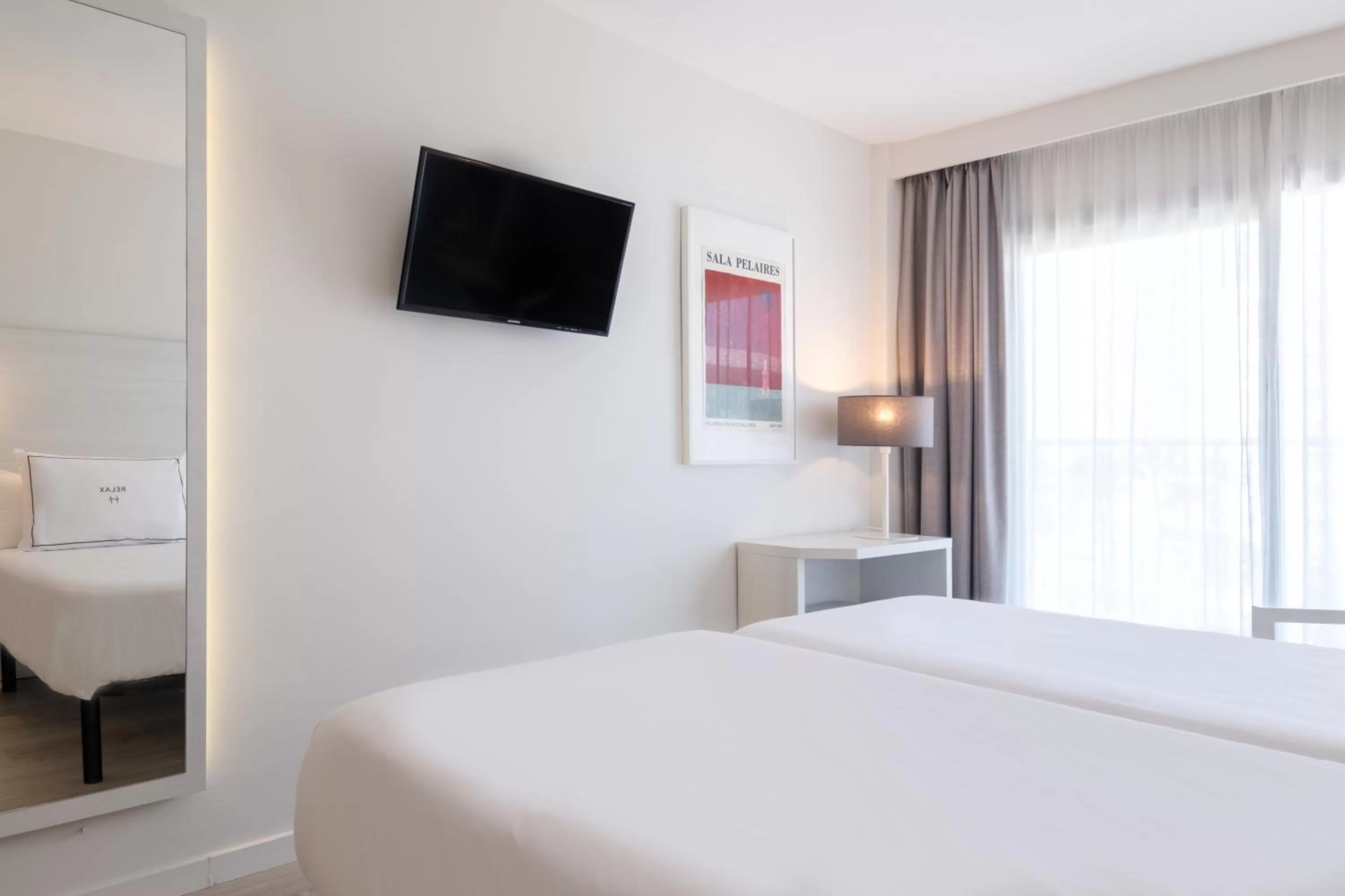 Bed in Helios Mallorca Hotel & Apartments