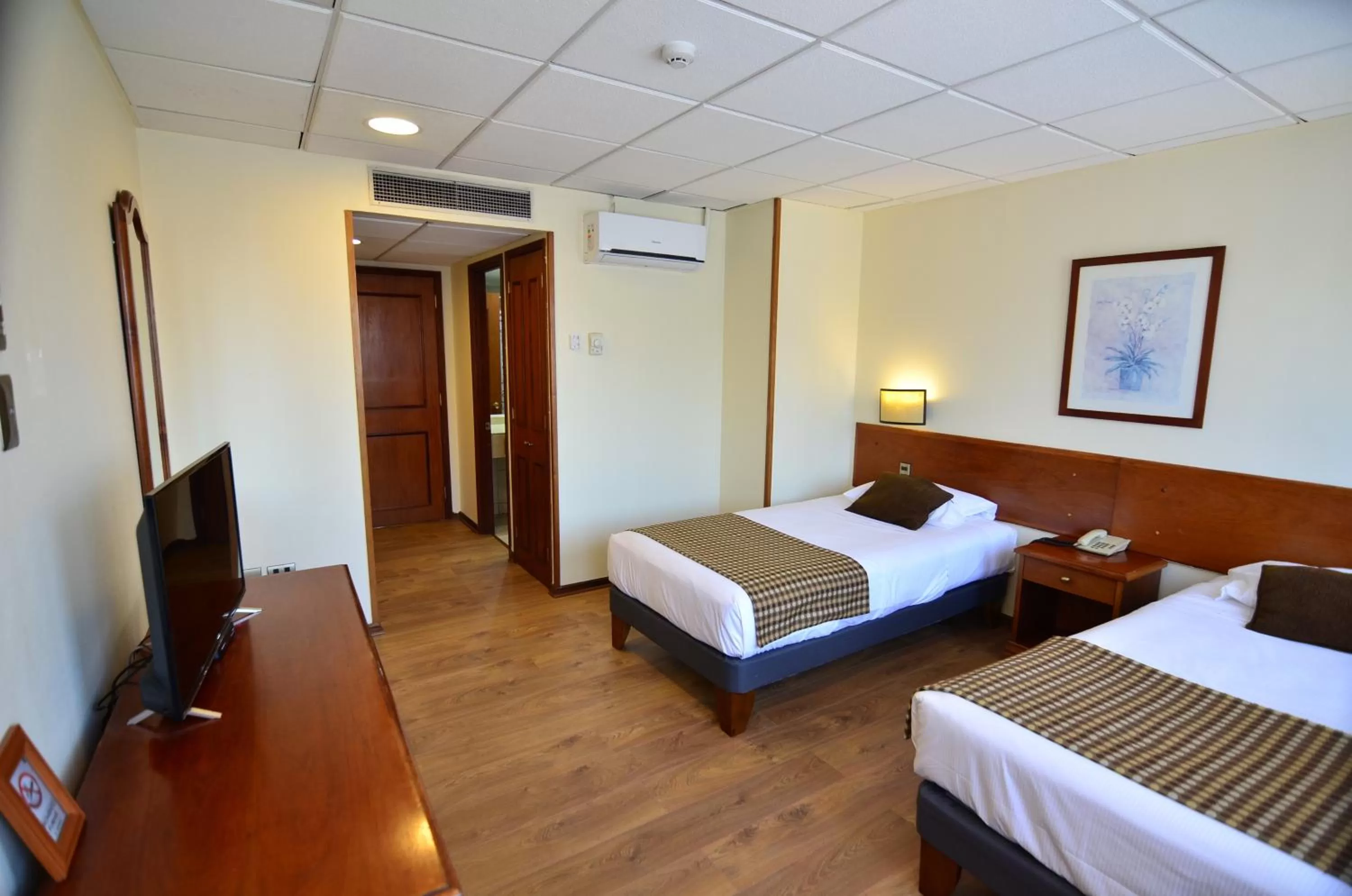 Communal lounge/ TV room, Bed in Tur Hotel Santiago