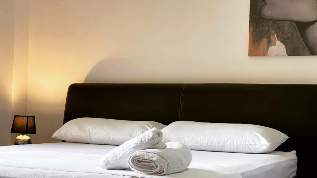 Bed in Hotel Ambasador