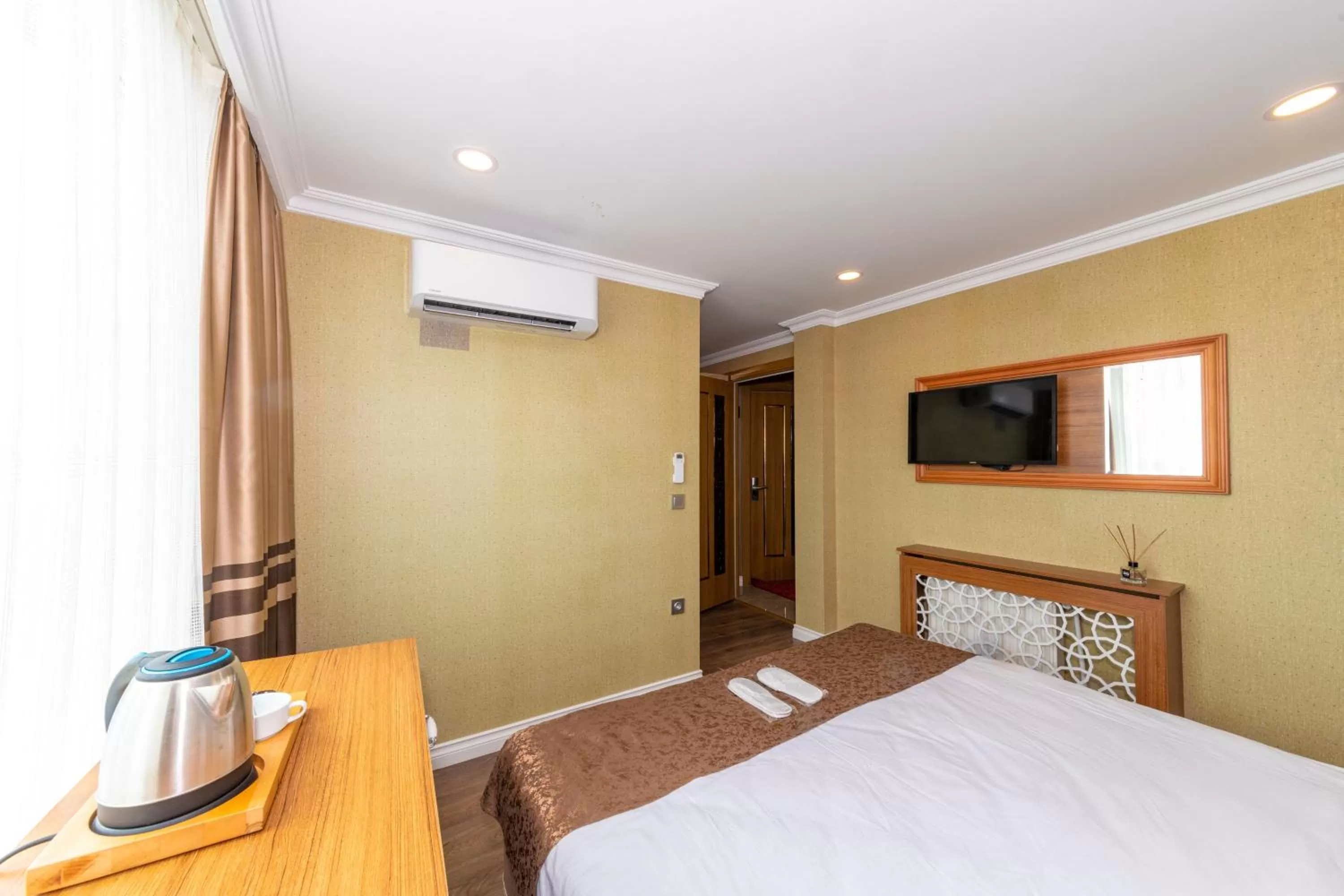 Bed in Golden Sand Hotel