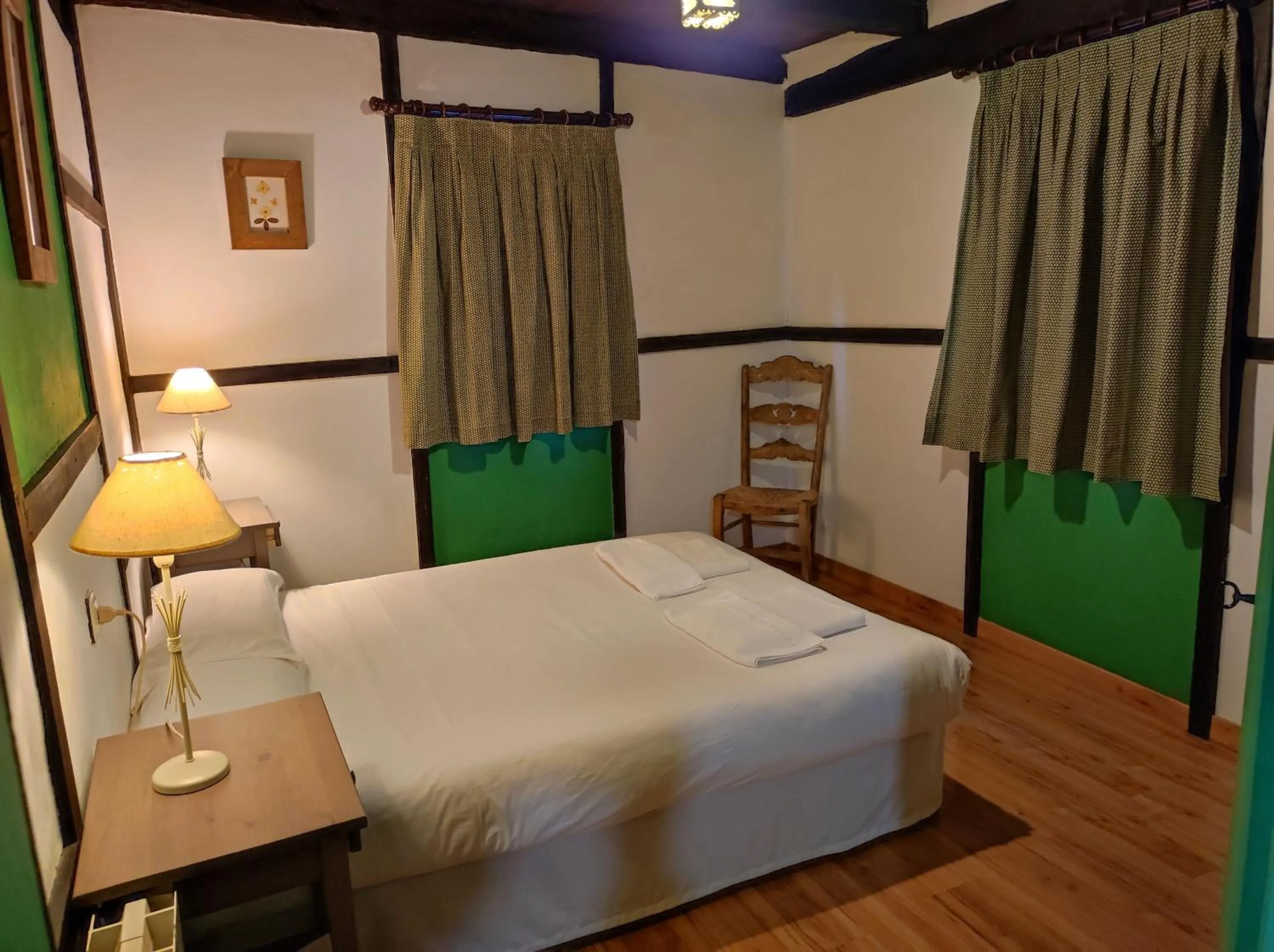 Bedroom, Bed in Viviendas Rurales El Covaju