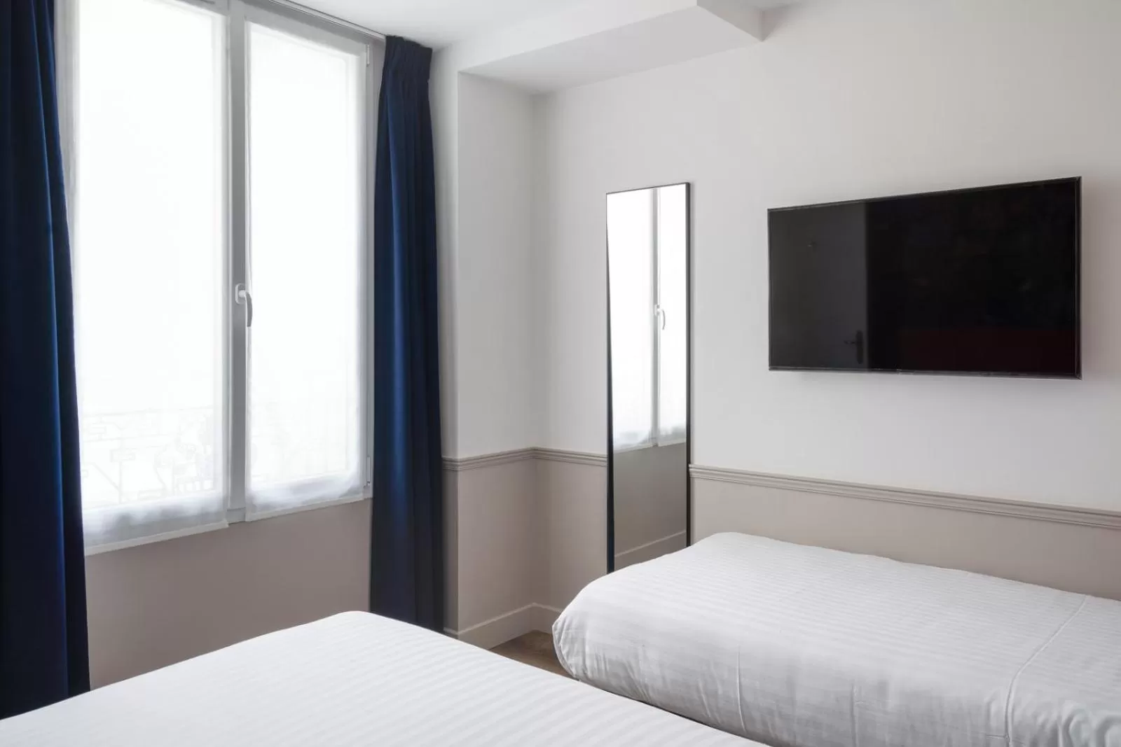 Bed in Hôtel 31 - Paris Tour Eiffel