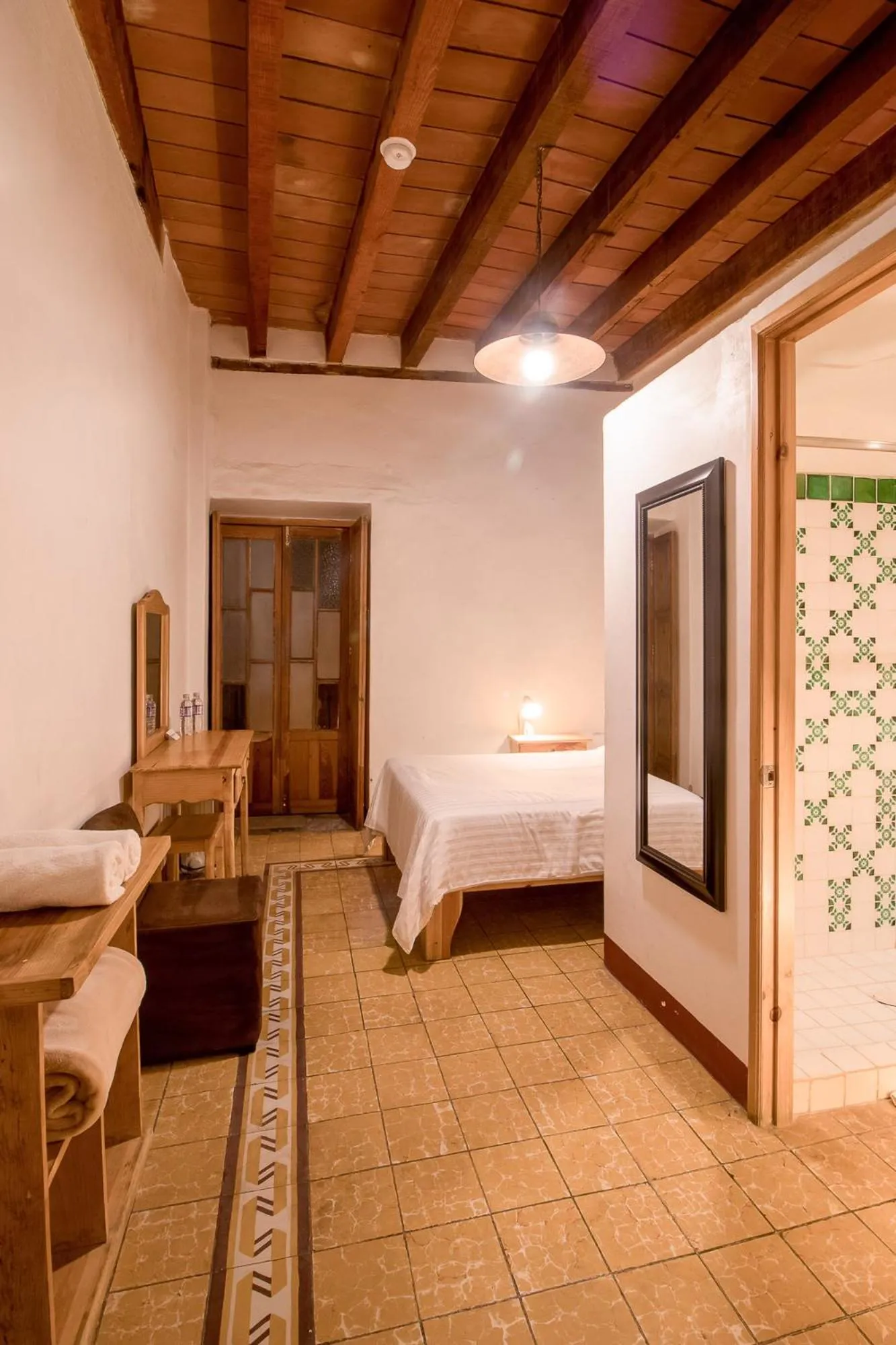 Bed in Hotel Meson Cuevano