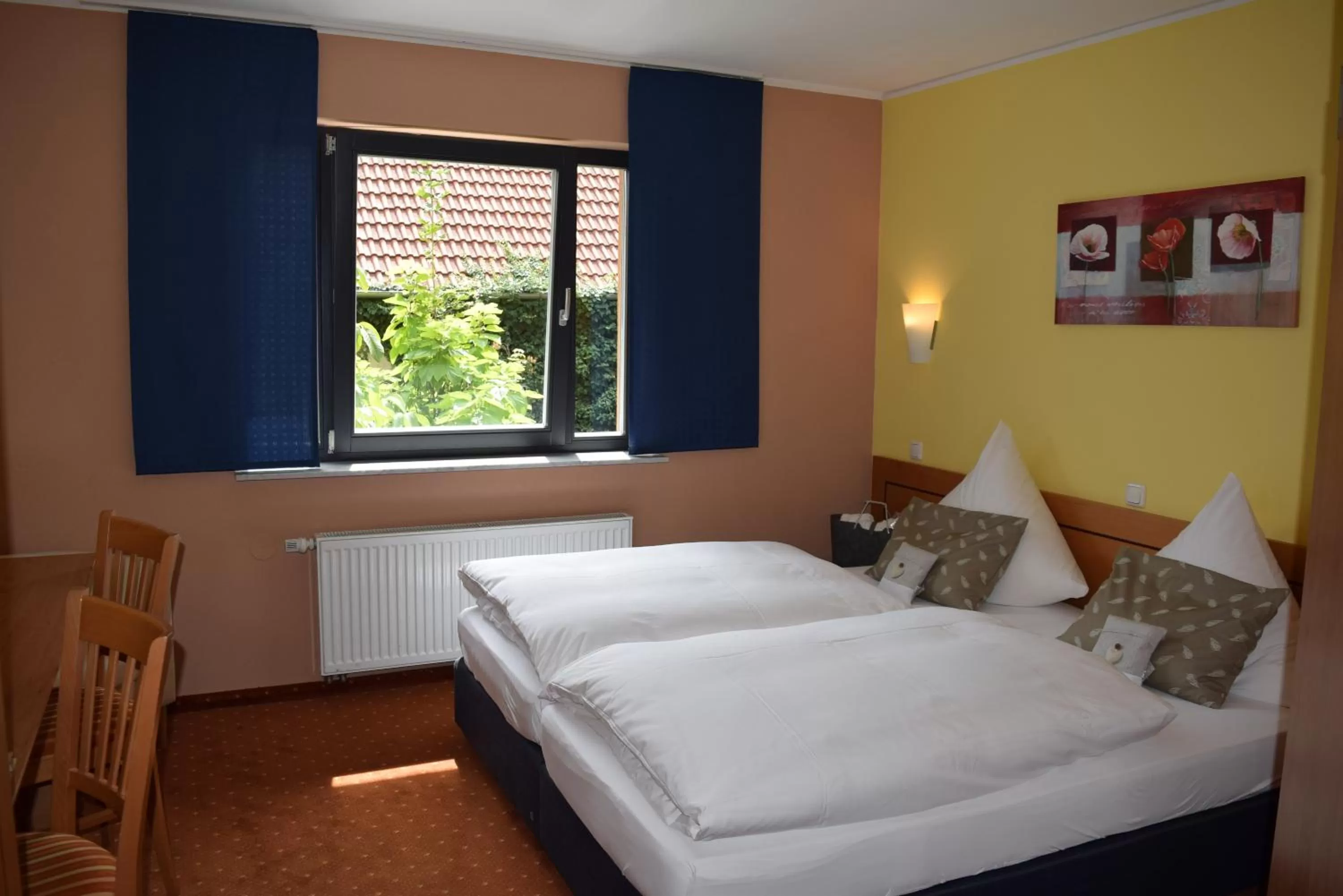 Photo of the whole room, Bed in BIO Hotel Bayerischer Wirt Augsburg