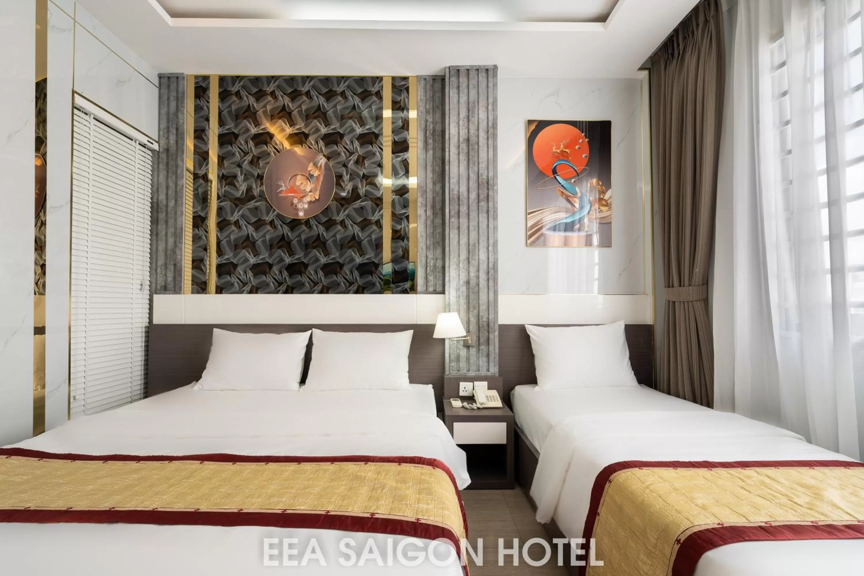 Bed in EEA Central Saigon Hotel