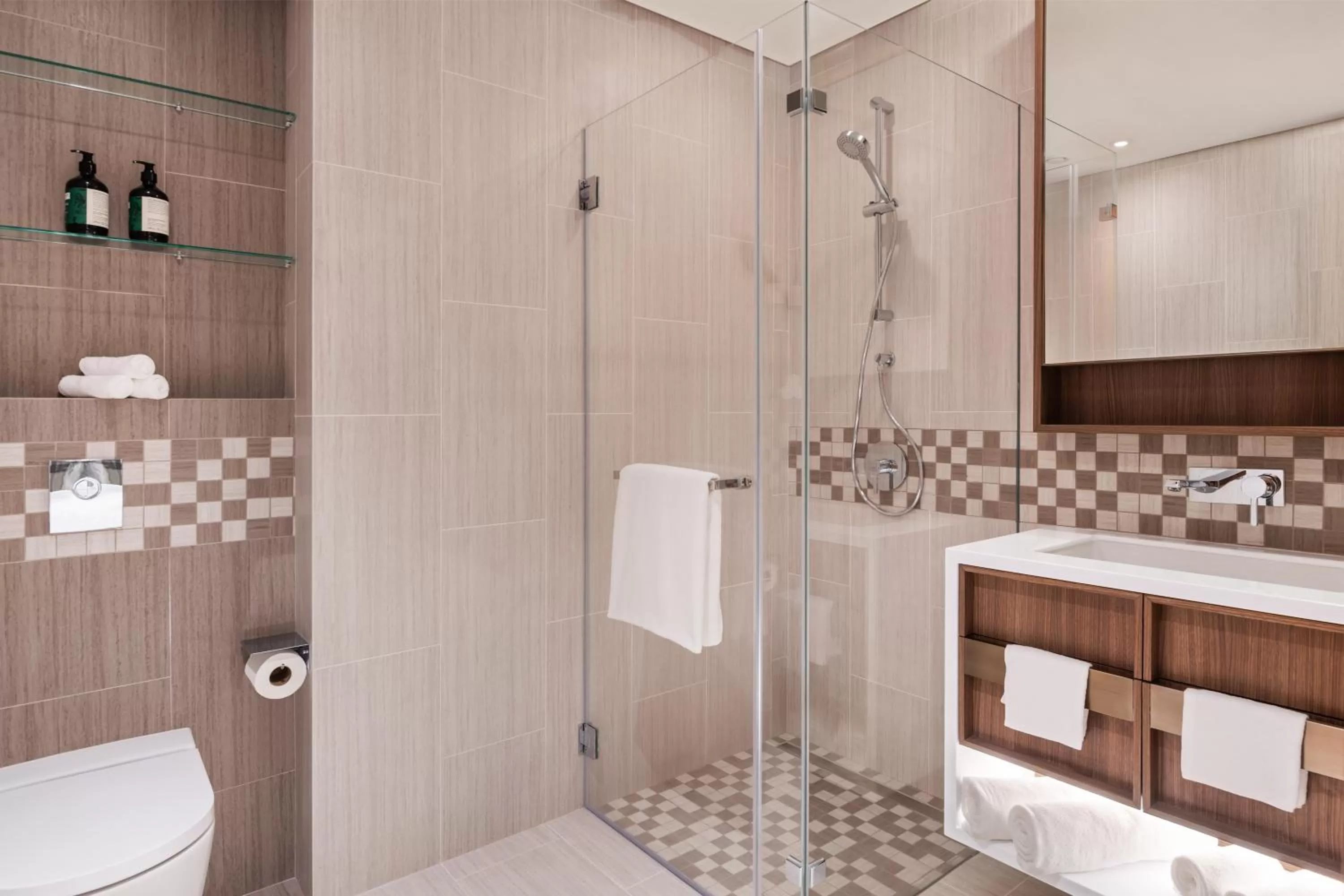 Bathroom in Staybridge Suites Dubai Al-Maktoum Airport by IHG
