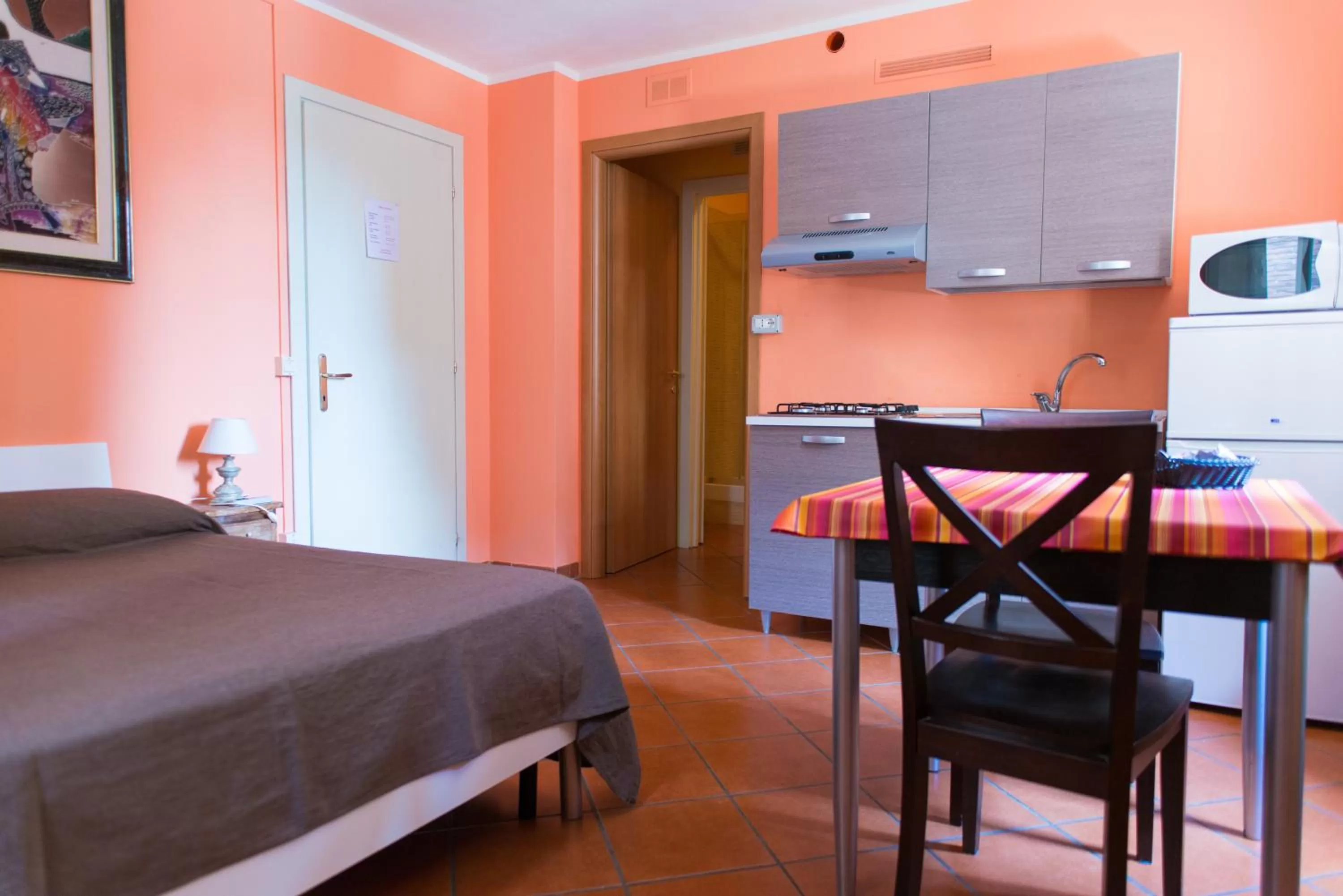 Seating area, Bed in Al Cardinale Rooms & Studios