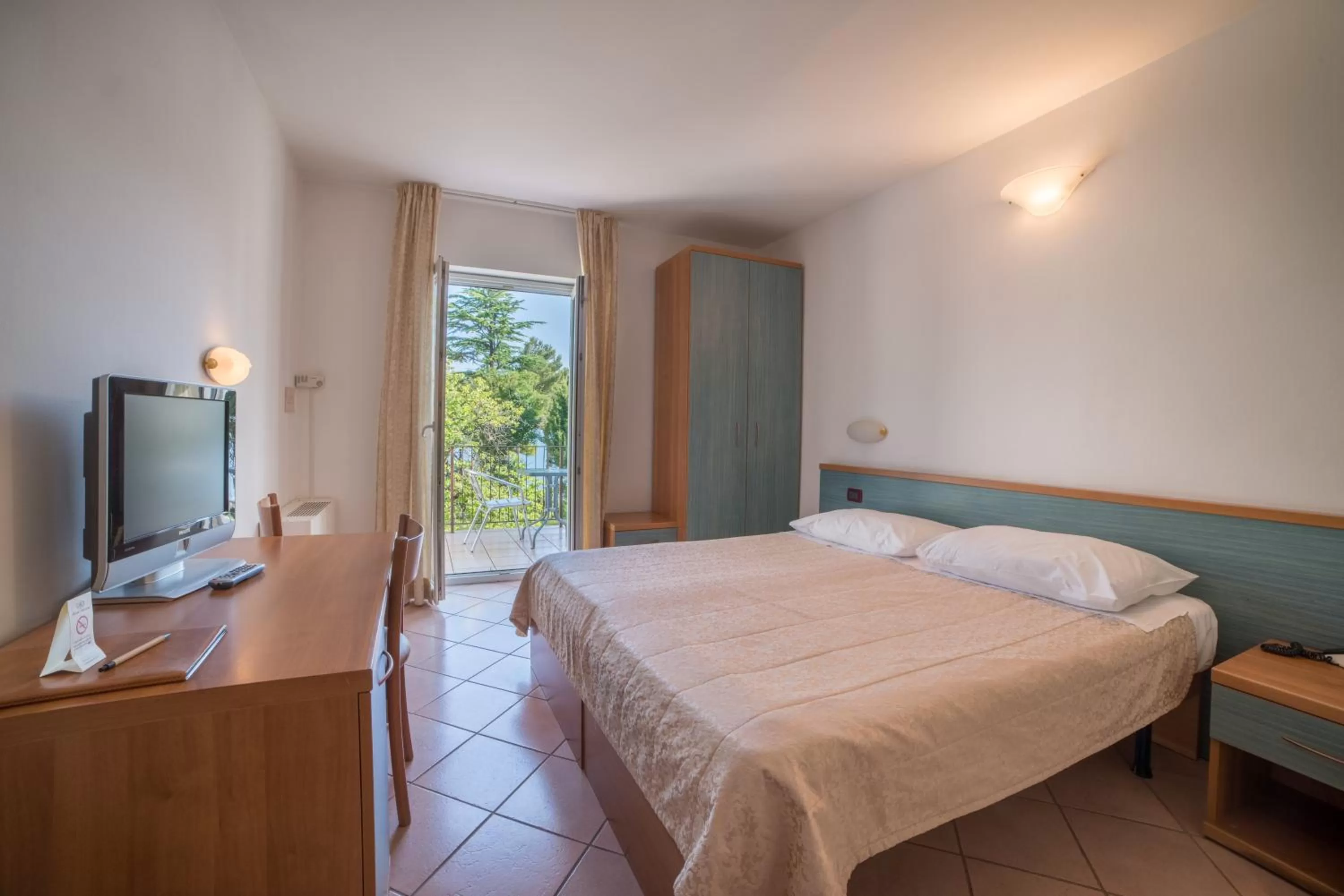 Bed in Belvedere Resort Hotels