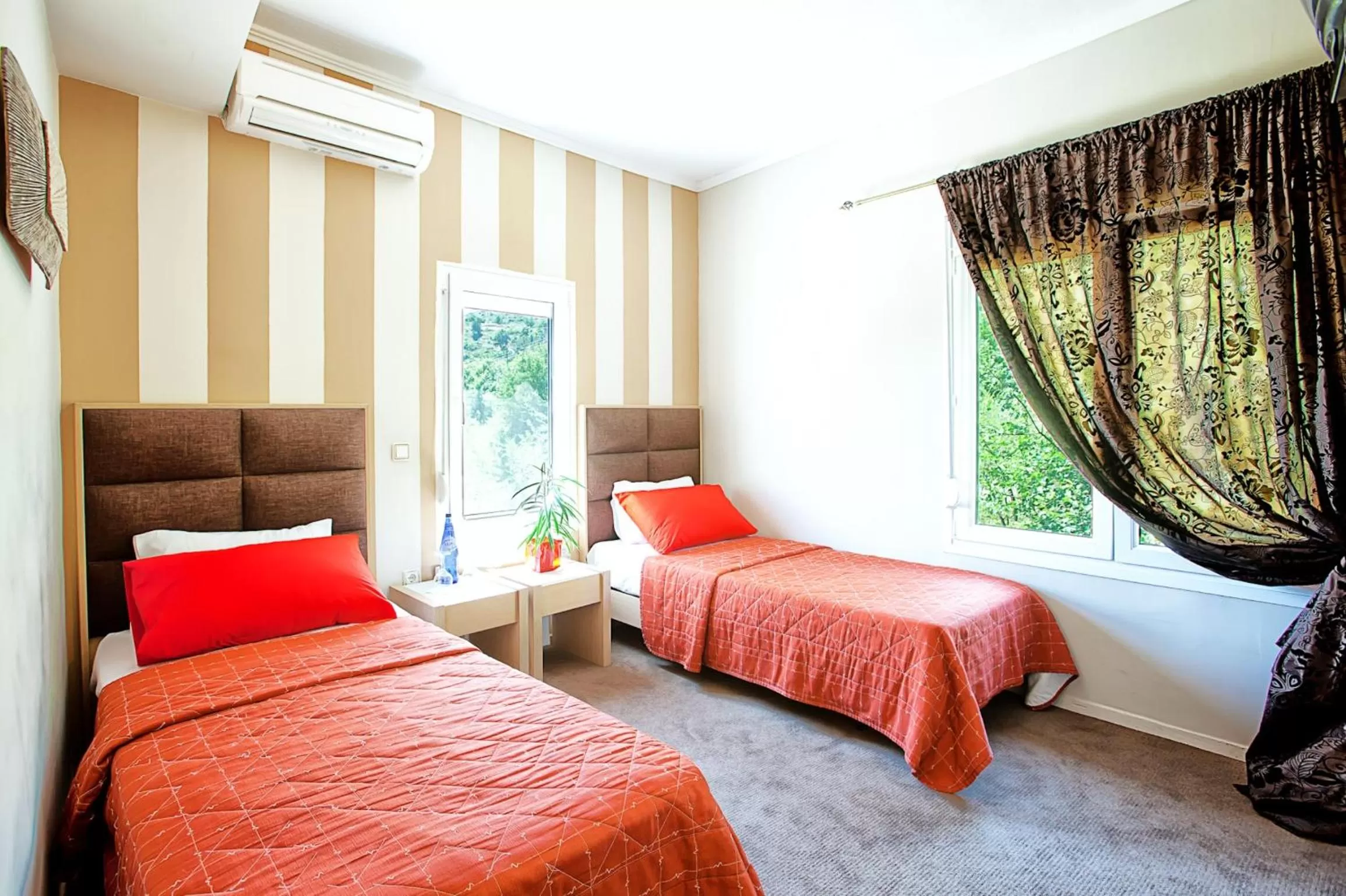 Bed in Anastassiou Hotel - Bike and motorcycle friendly hotel