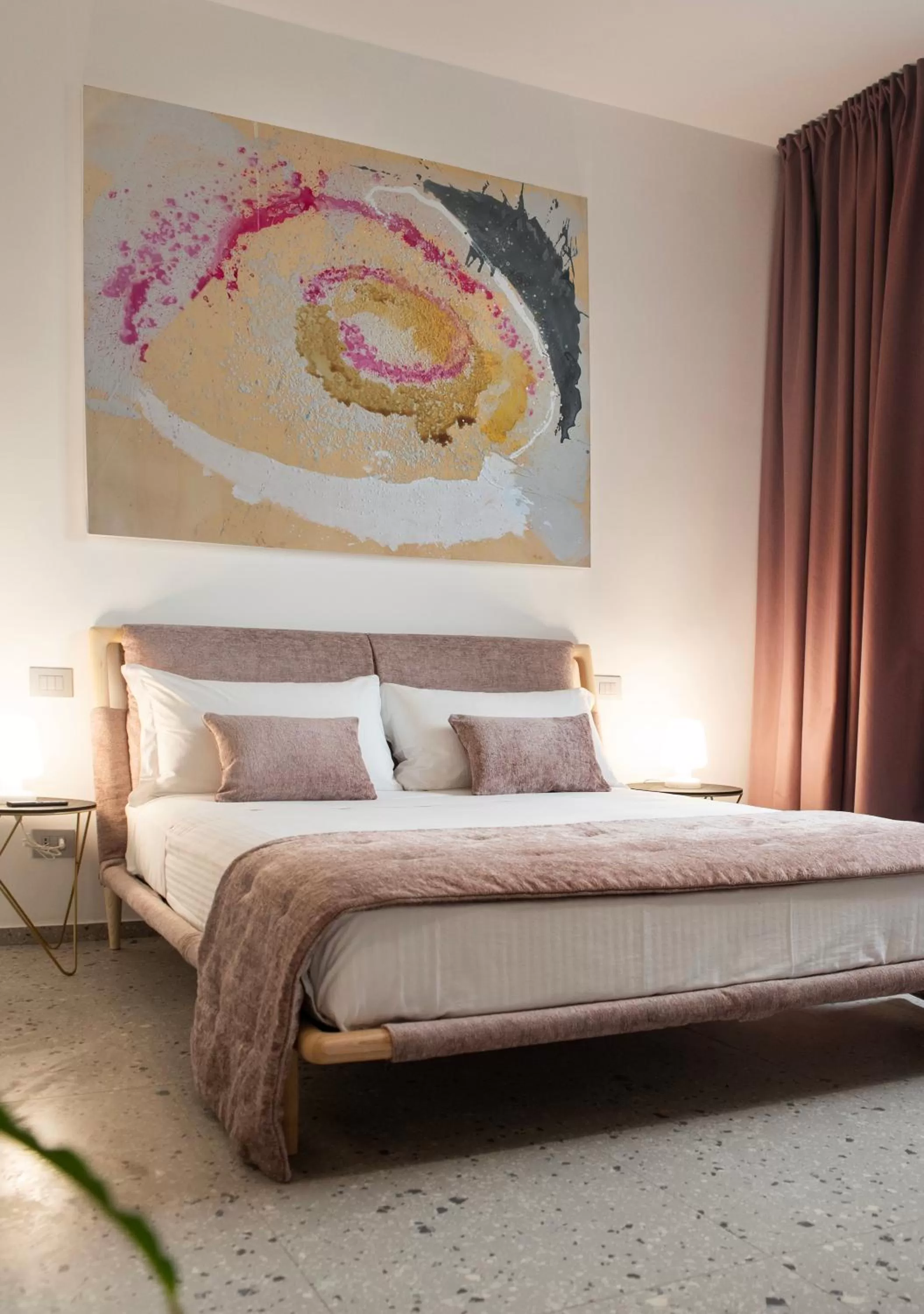 Bed in Lisetta Gardens Boutique & Suites