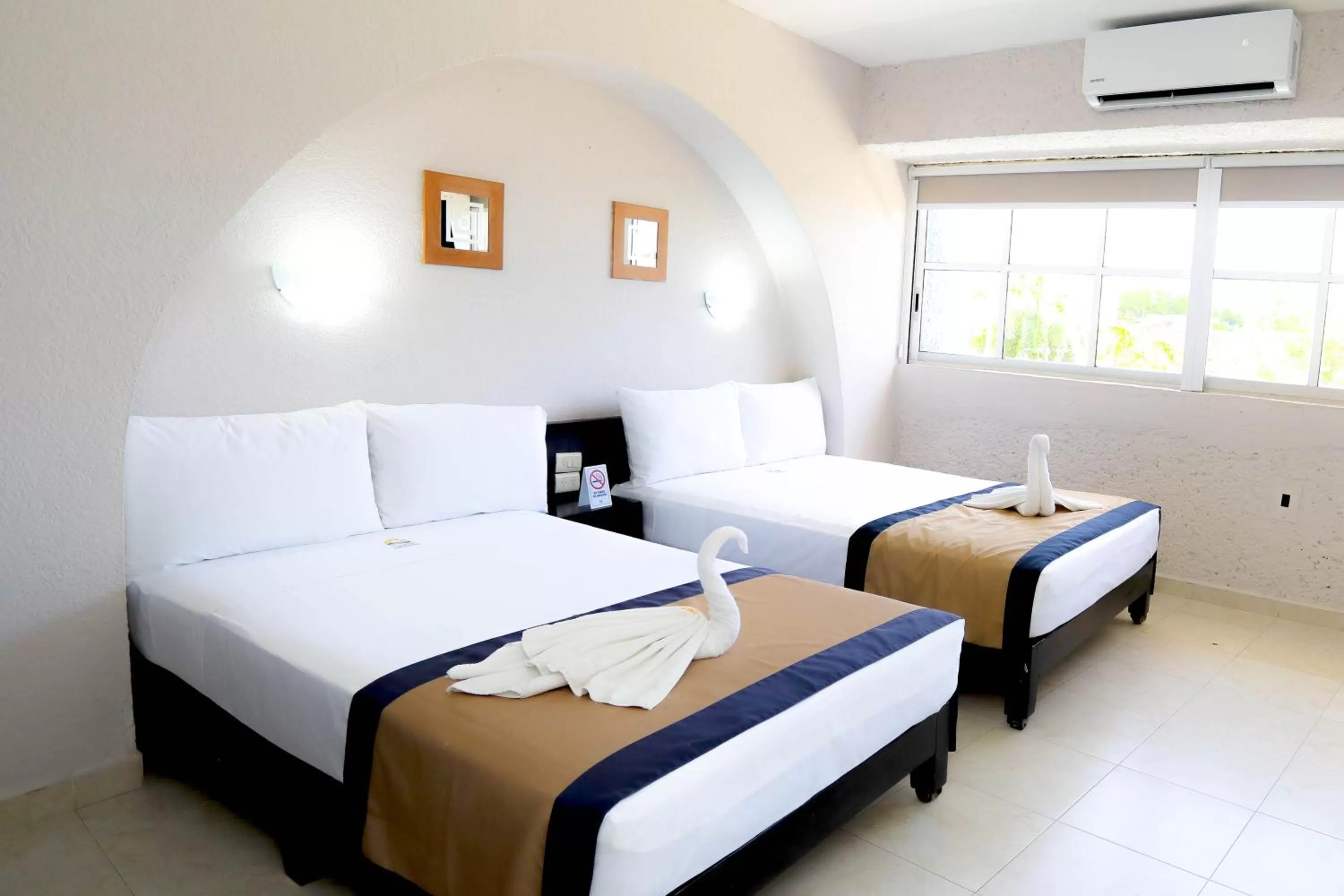 Bed in Hotel Caribe Internacional Cancun