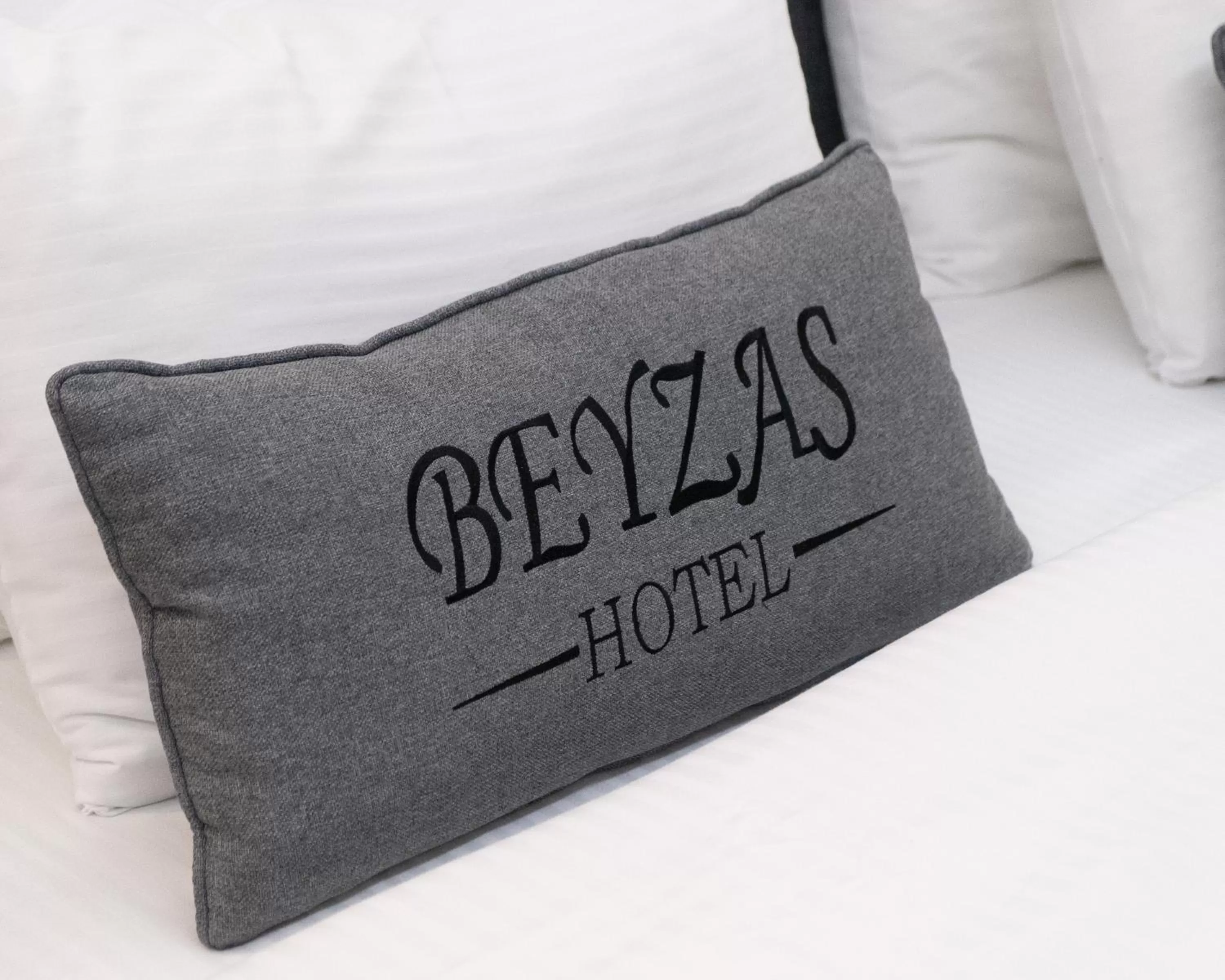 Bed, Property Logo/Sign in Beyzas Hotels & Suites