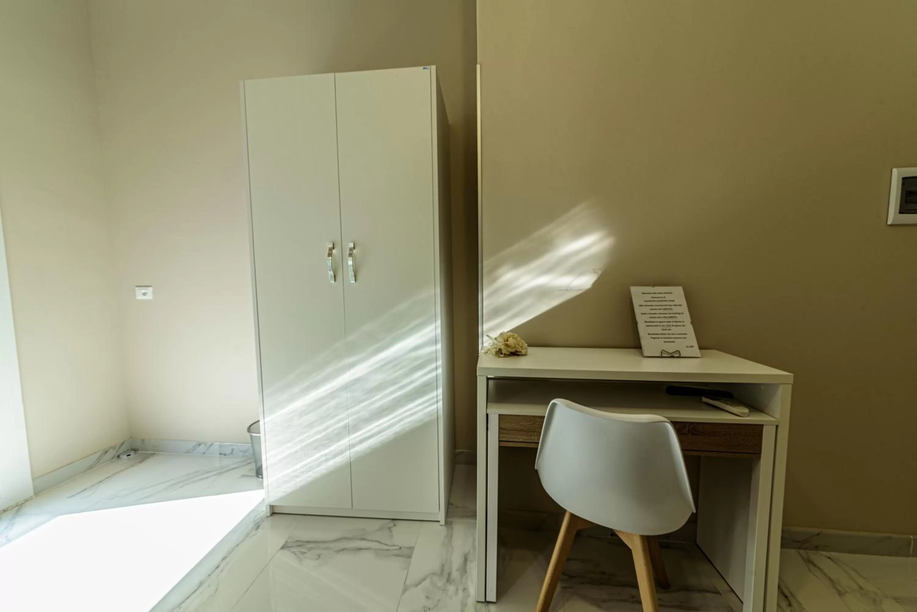 Photo of the whole room in Corleone GUESTHOUSE