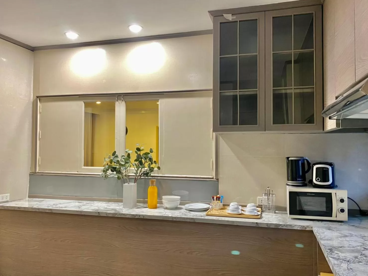 Kitchen or kitchenette in Asoke Residence Sukhumvit by UHG