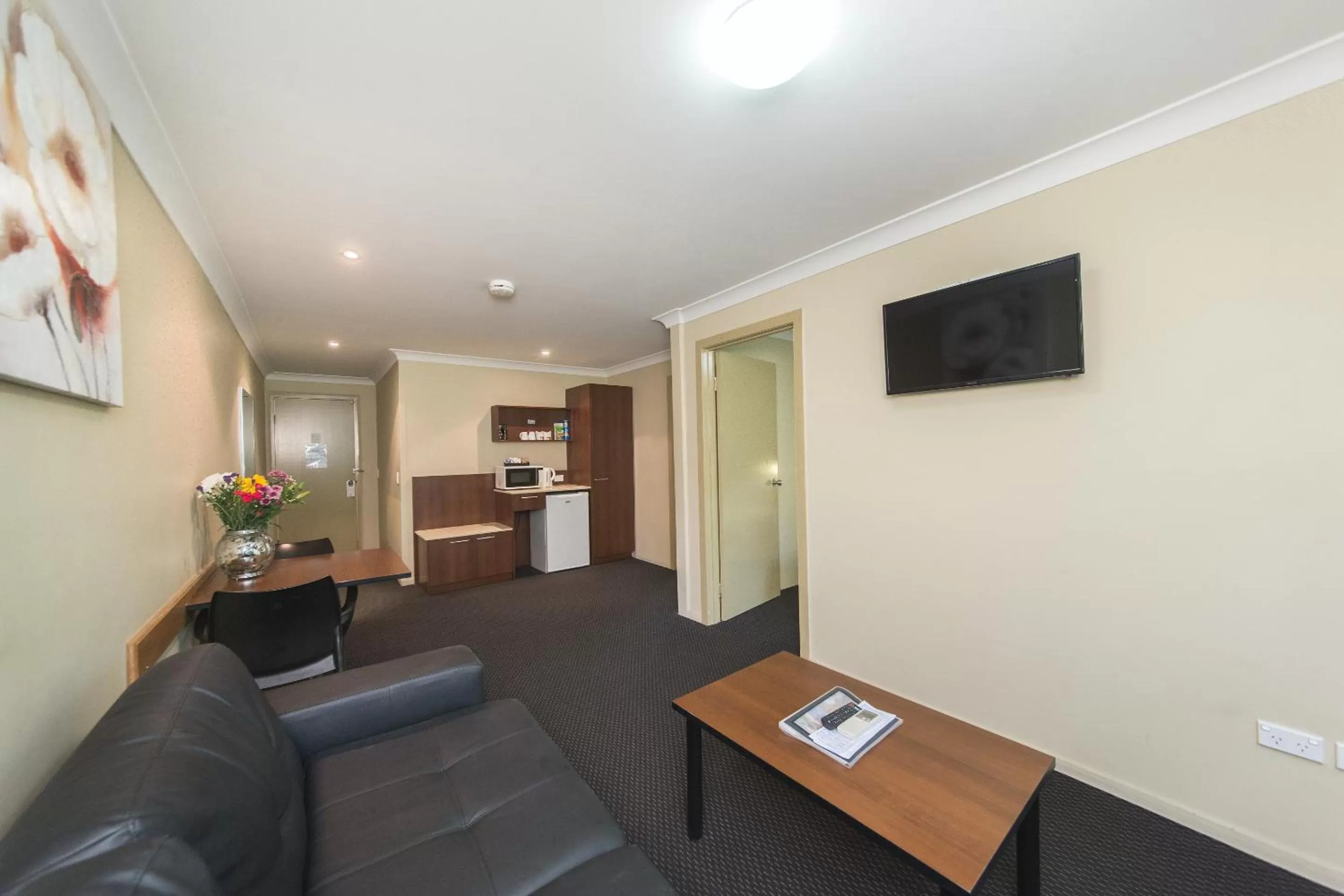 Living room in Rocky Resort Motor Inn