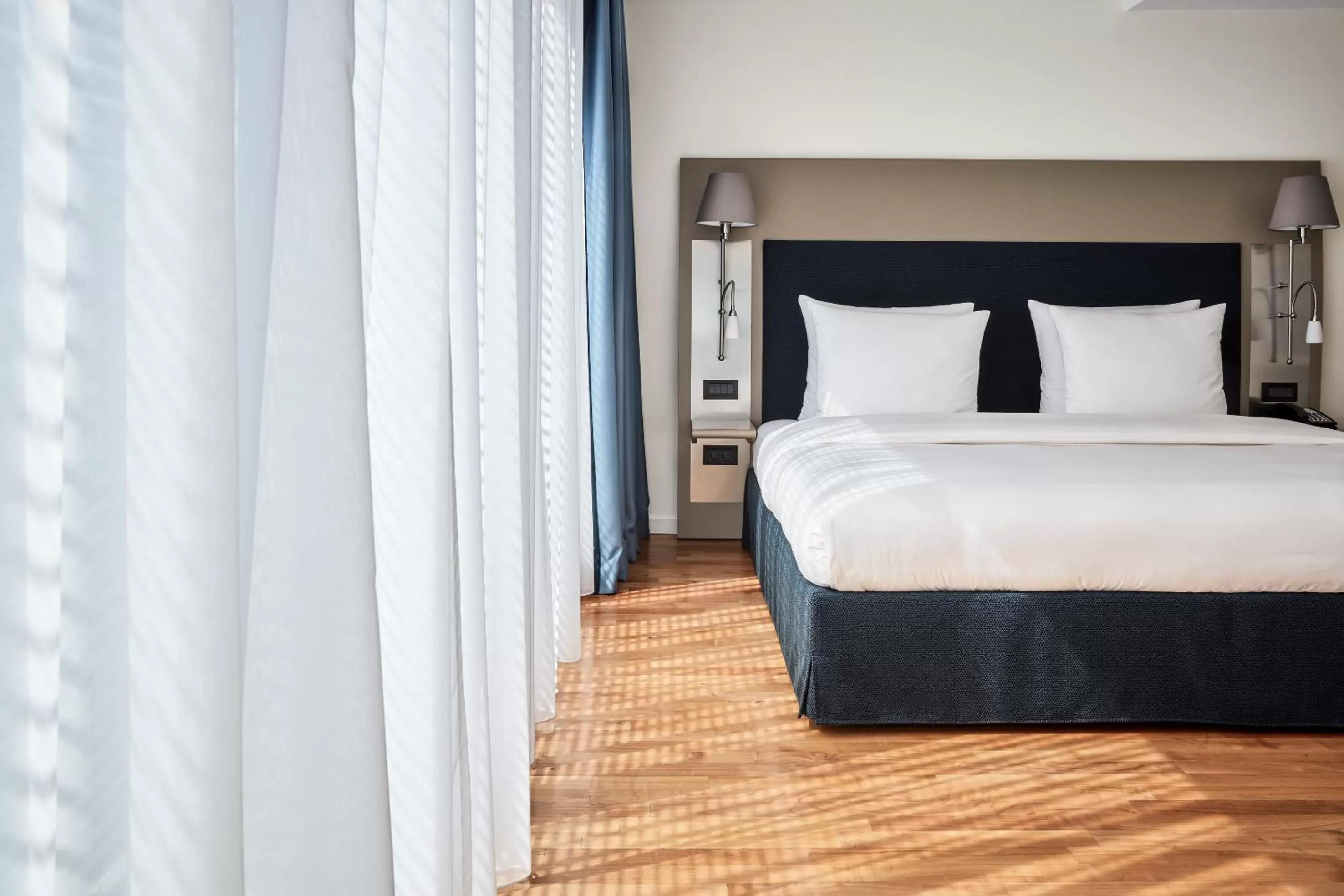 Photo of the whole room, Bed in The Mandala Berlin, a Member of Design Hotels