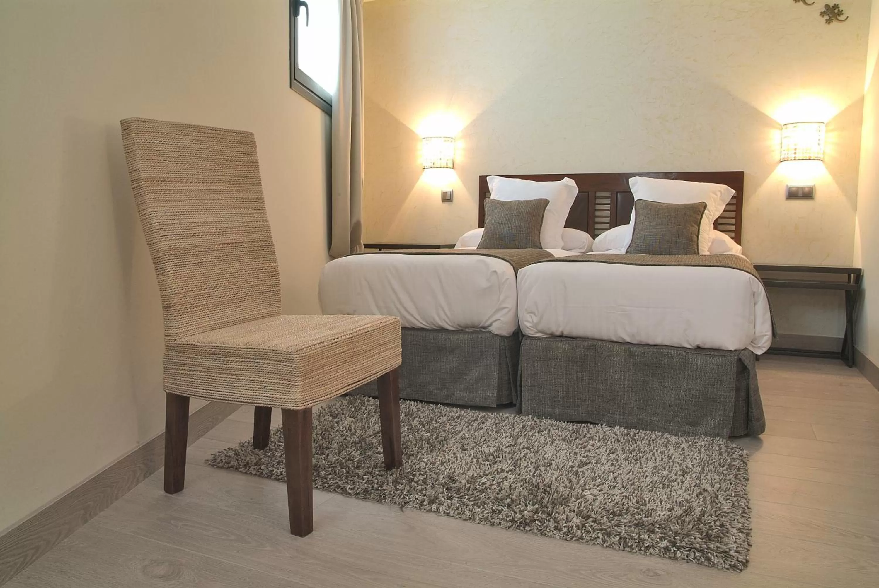 Bed in Le Petit Boutique Hotel