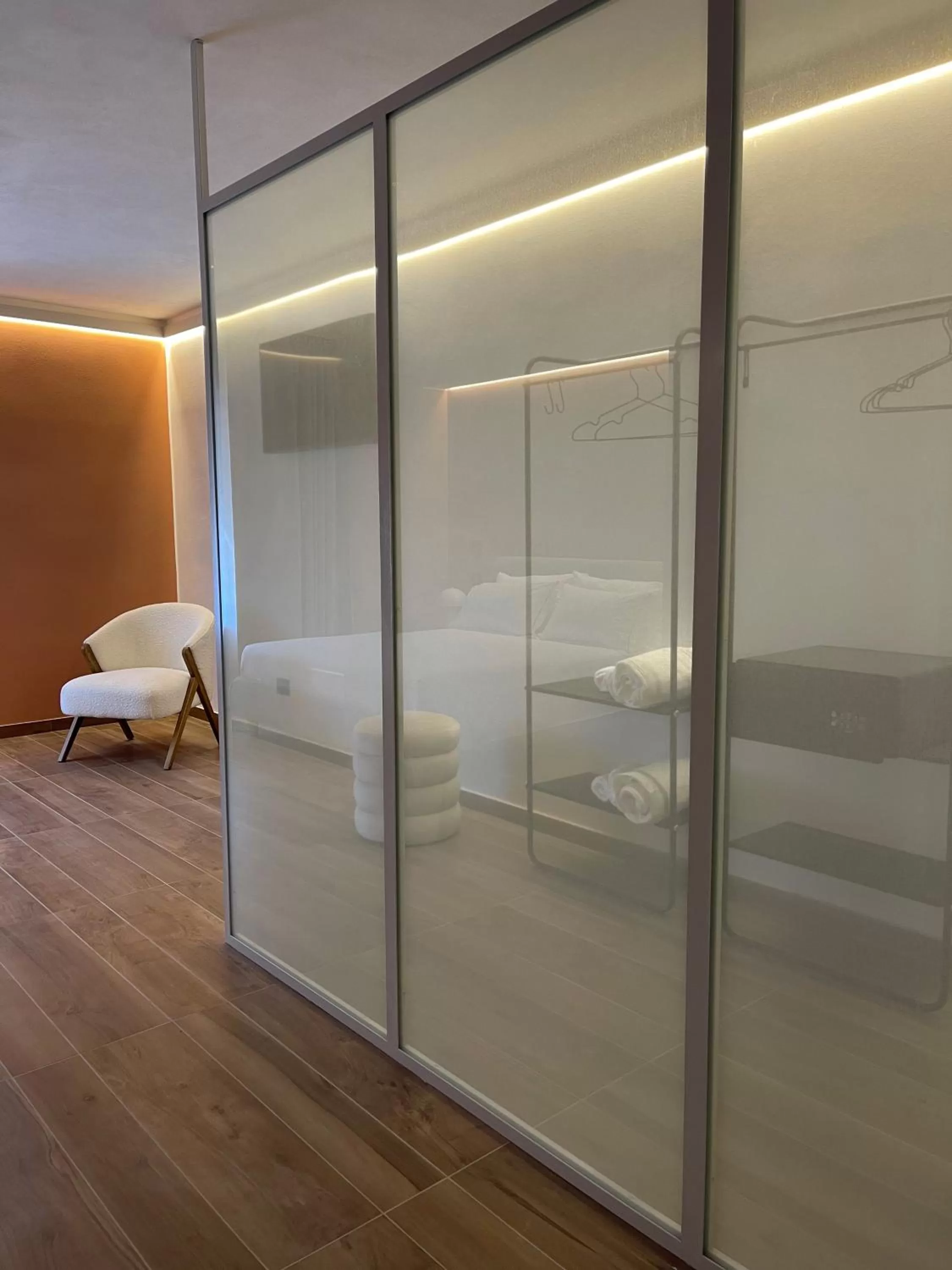 Photo of the whole room, Bathroom in Raha Suites