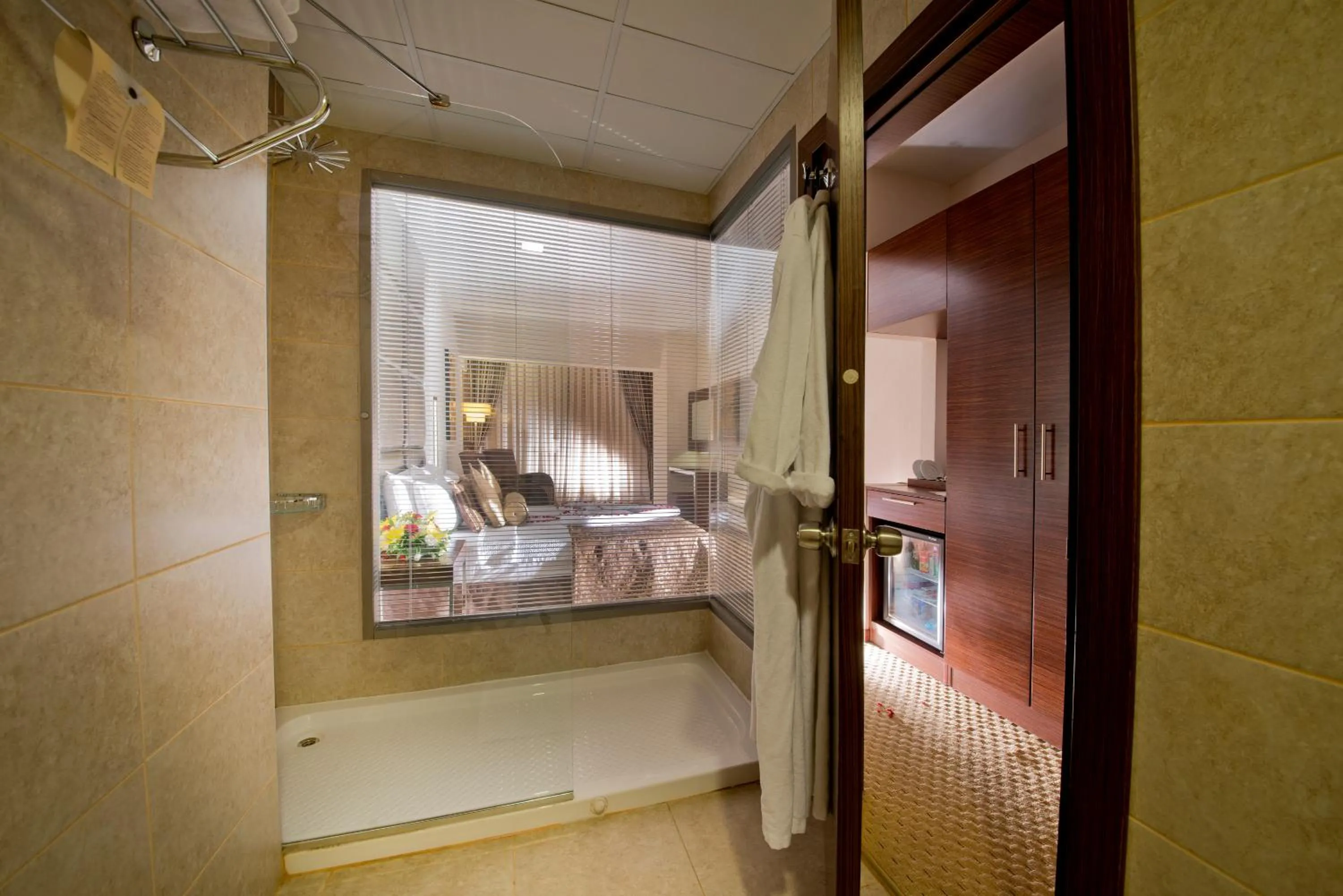 Bathroom, Bed in North Point Hotel
