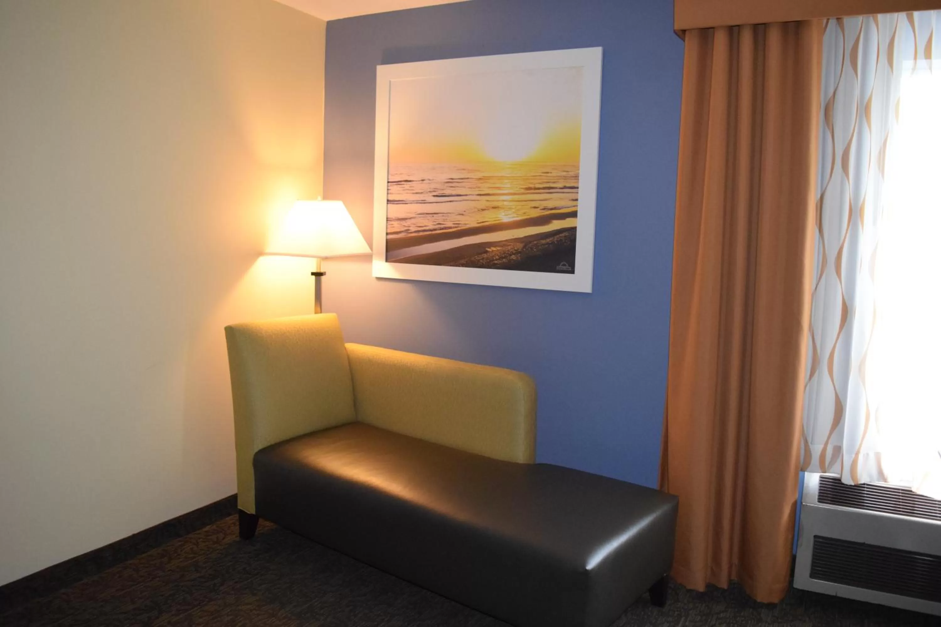 Seating area in Days Inn by Wyndham Cadillac
