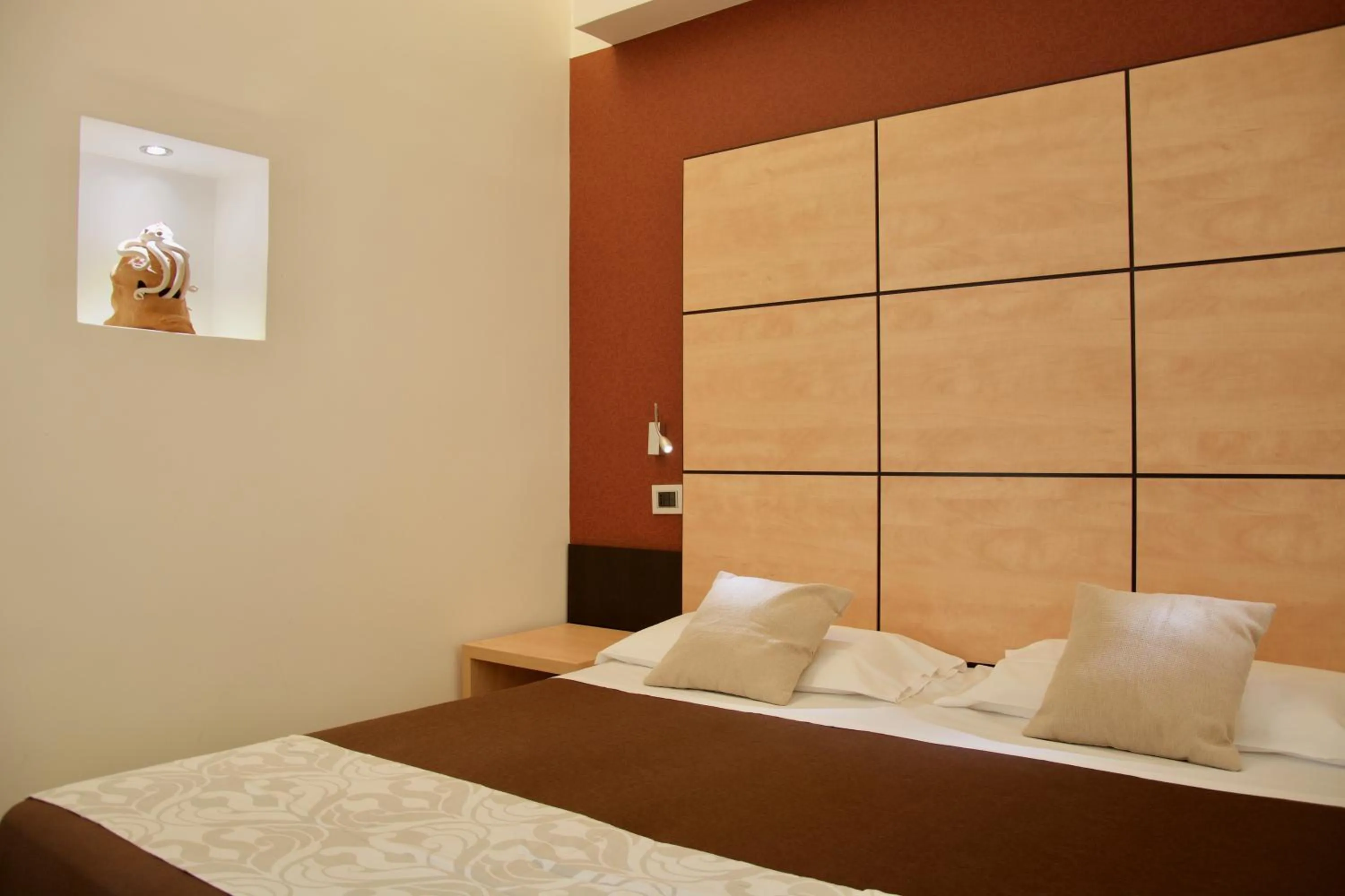 Bed in Hotel Cimarosa