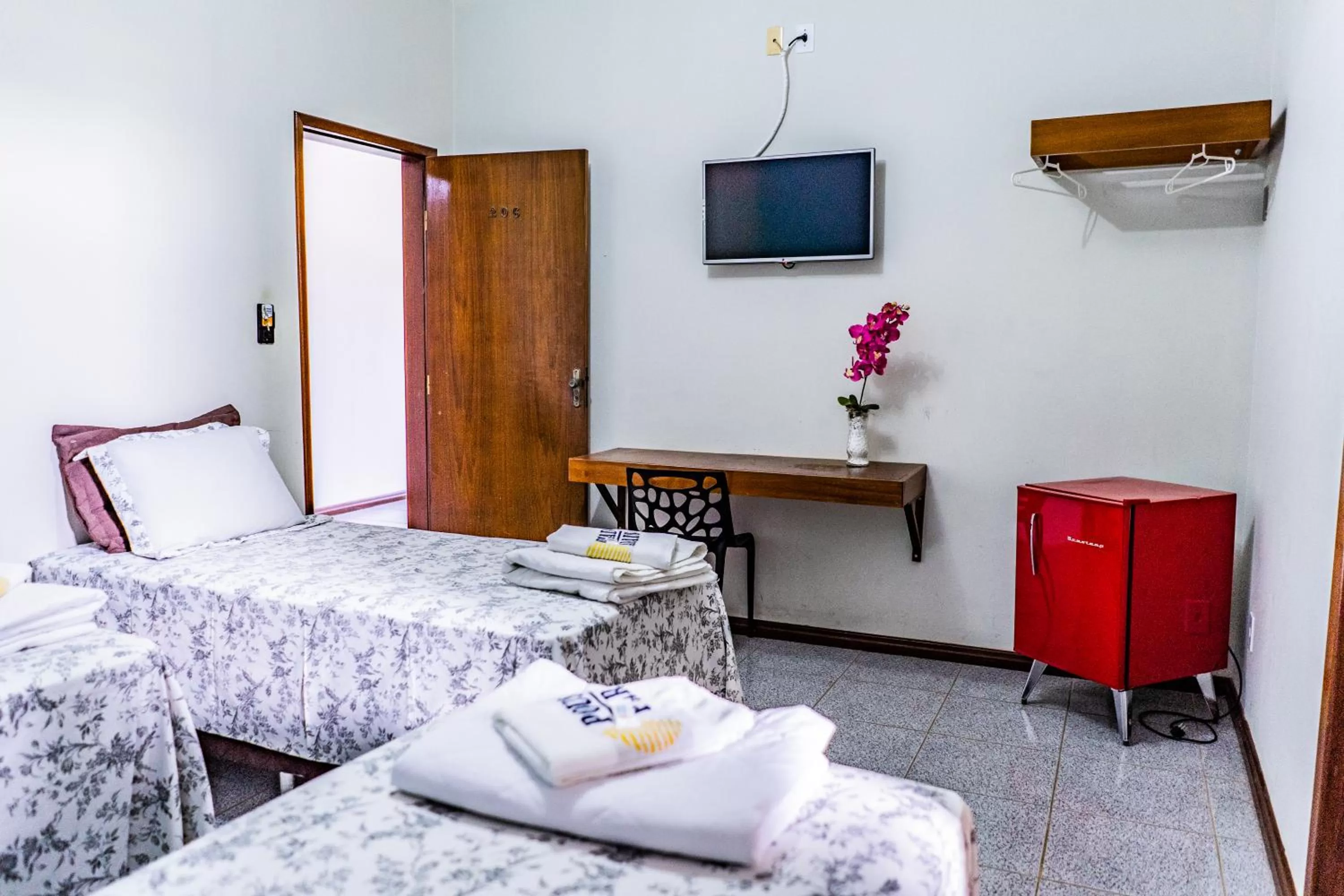 Bed in Pousada Paraiso