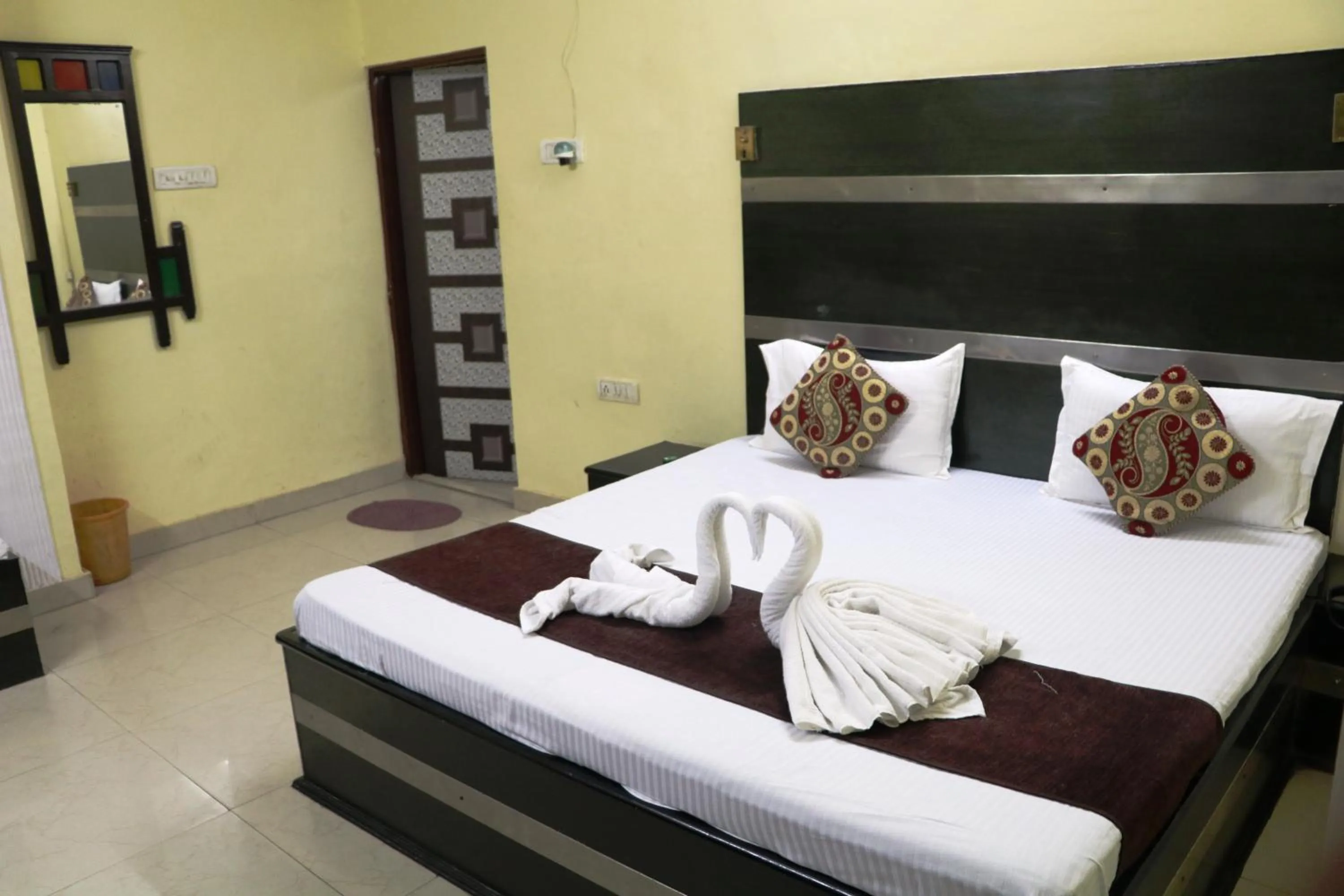 Bed in Hotel Vaishnavi