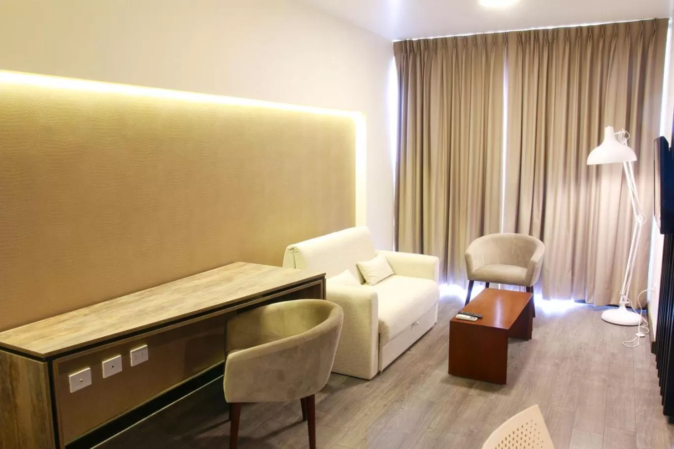 Living room in Urban Suites Apart Hotel
