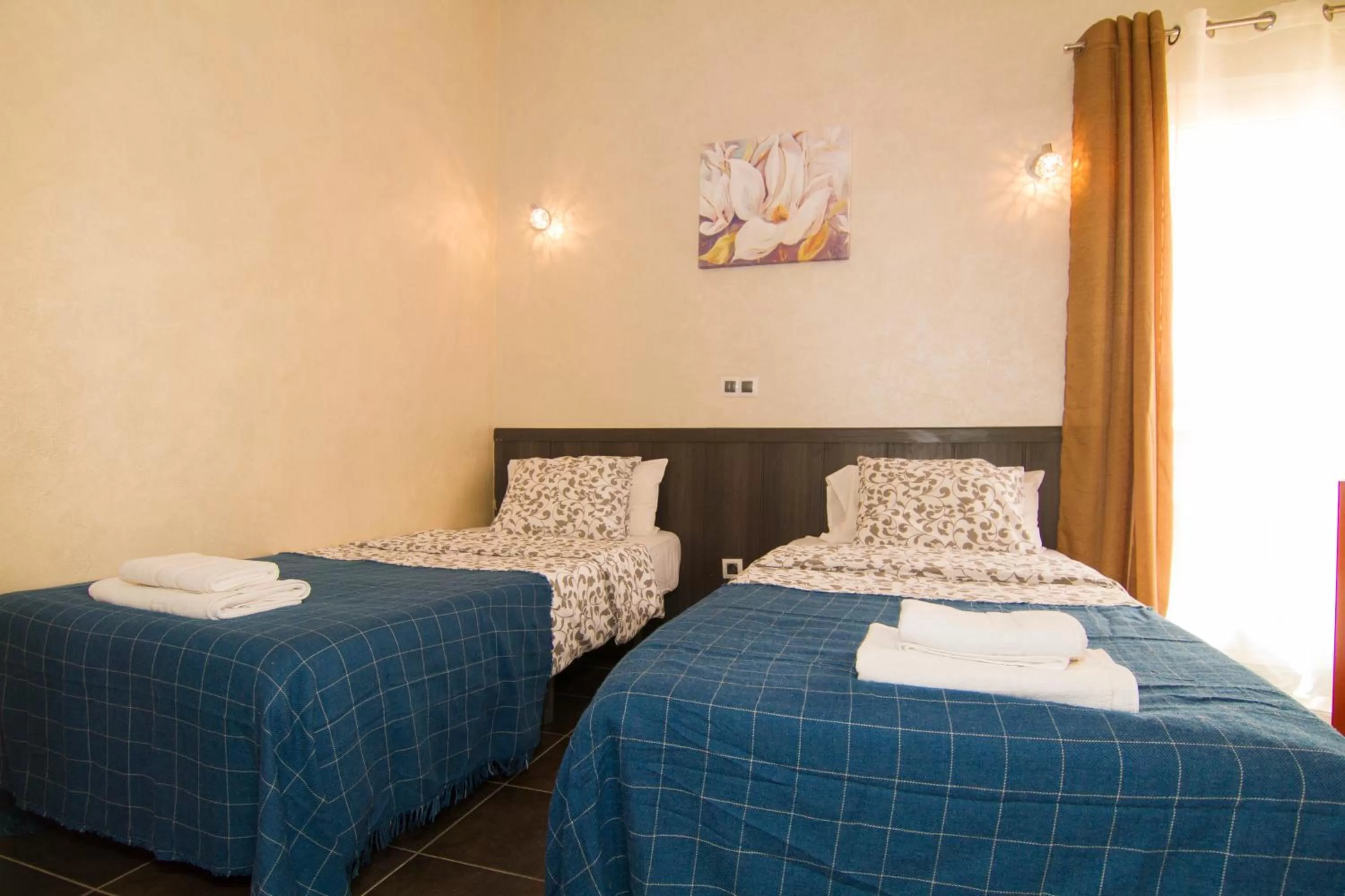 Bed in Yucca Park ApartHotel