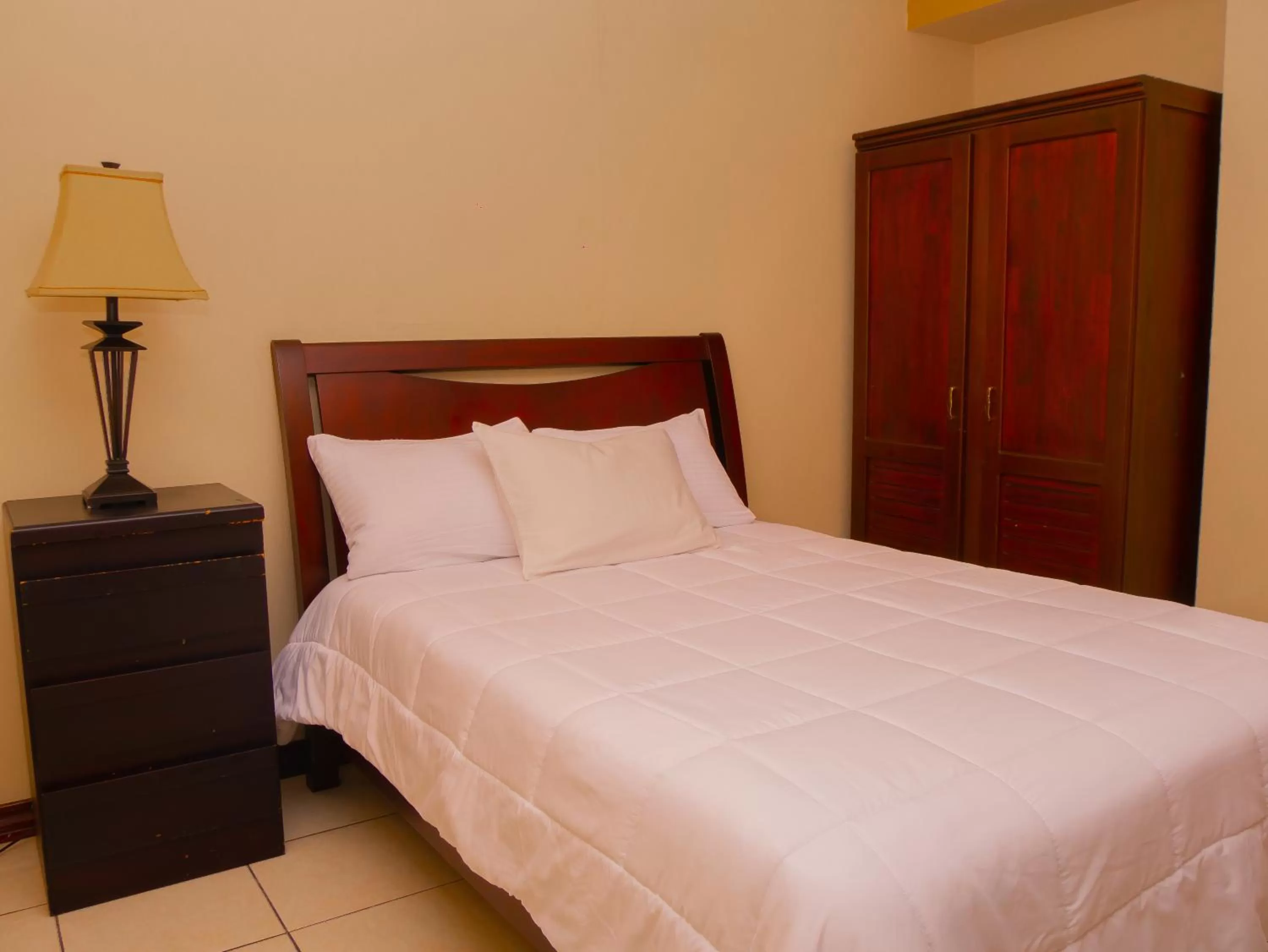 Bed in Hotel Bamboo Aeropuerto