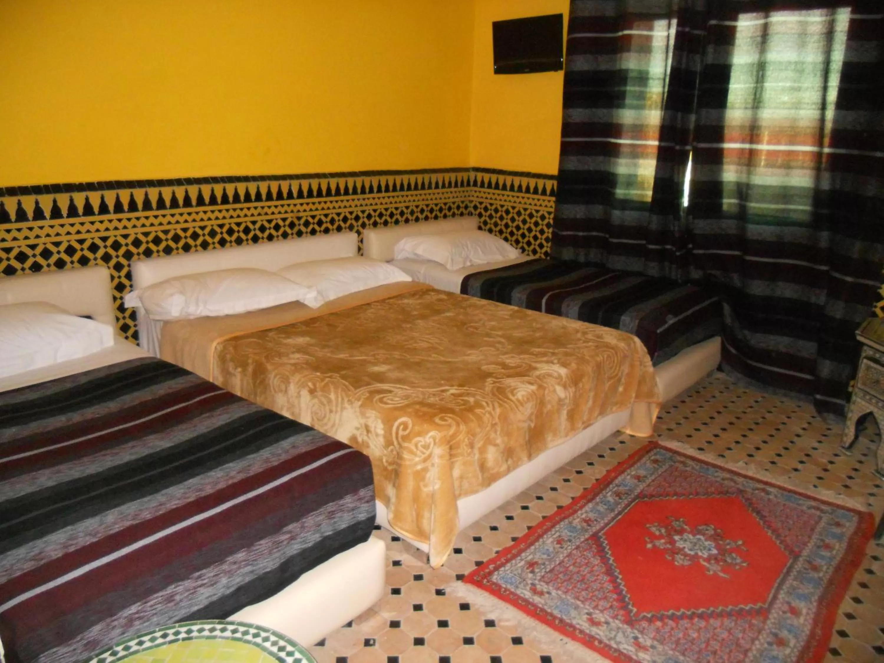 Bed in Riad Passiflora