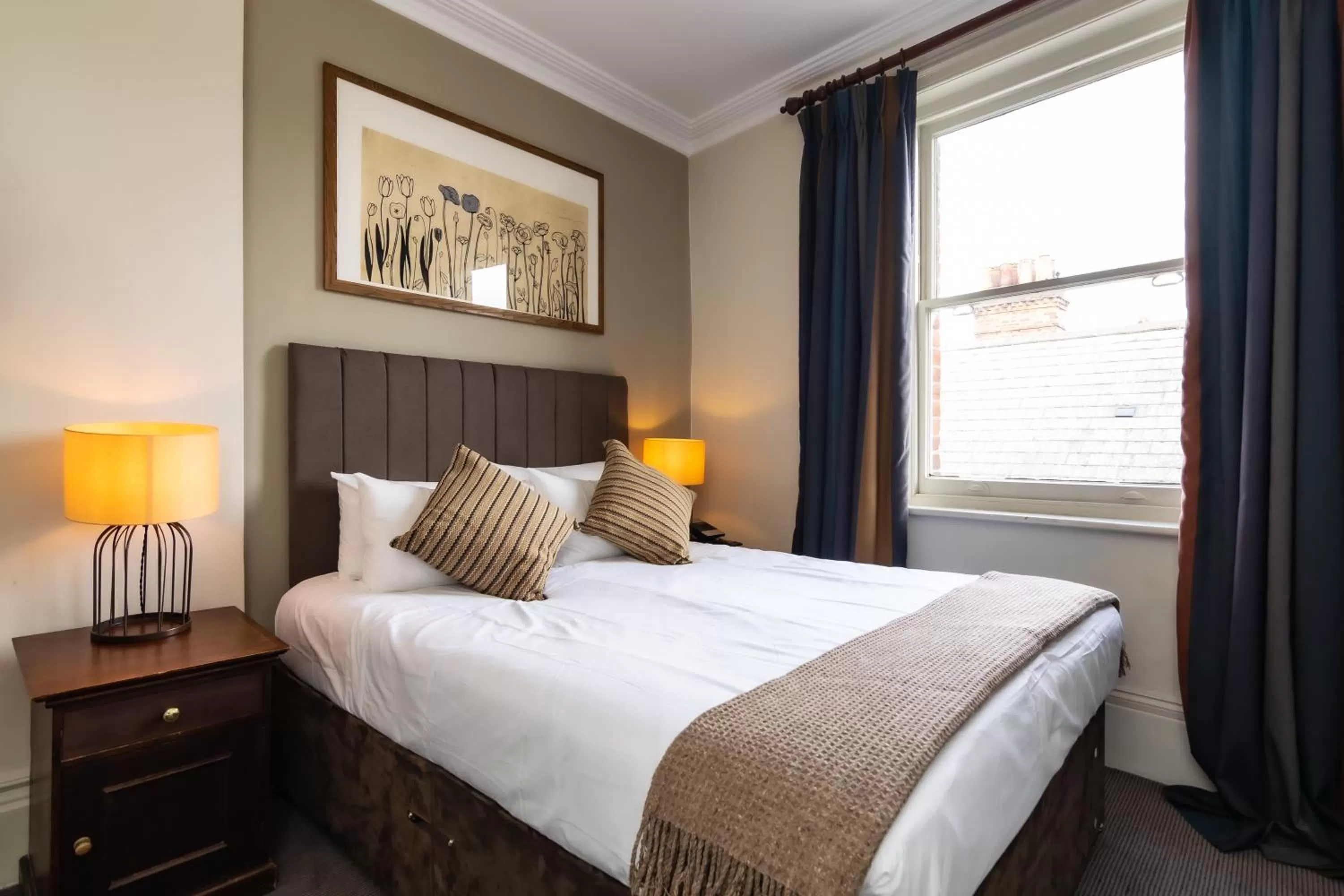 Bed in Kew Gardens Hotel