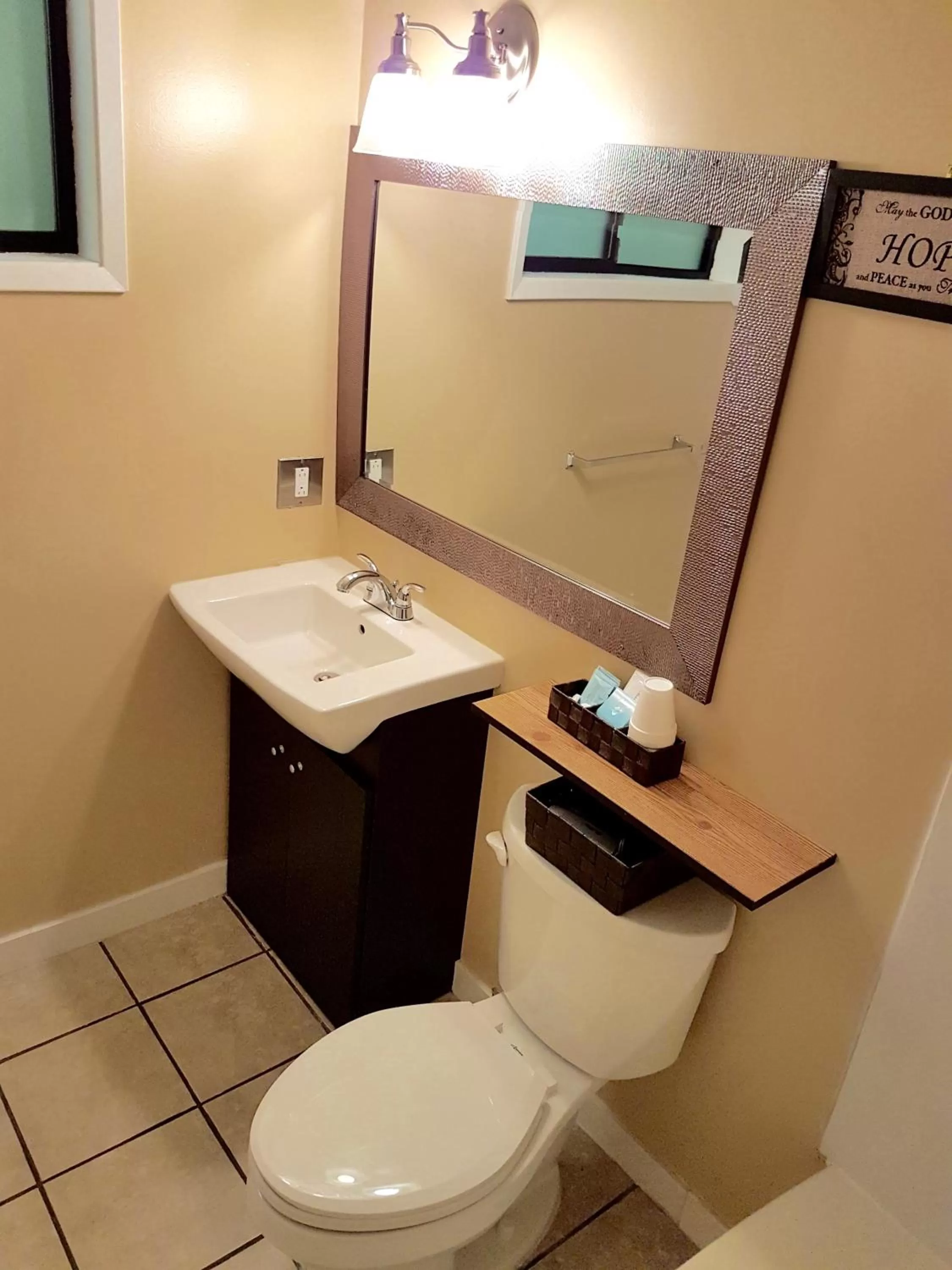 Toilet in Above Tide Motel