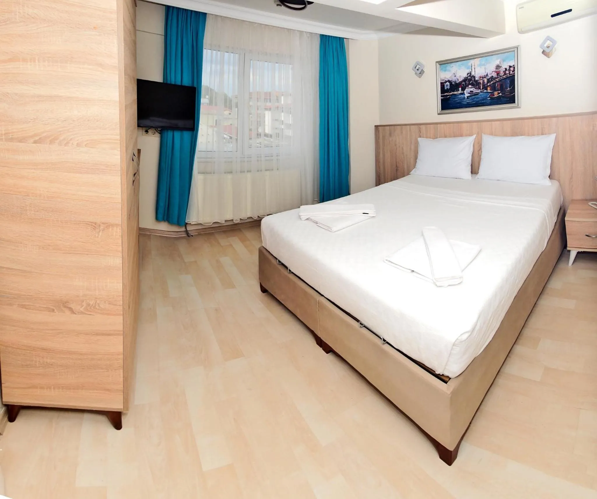 Bed in Le Safran Palace Hotel