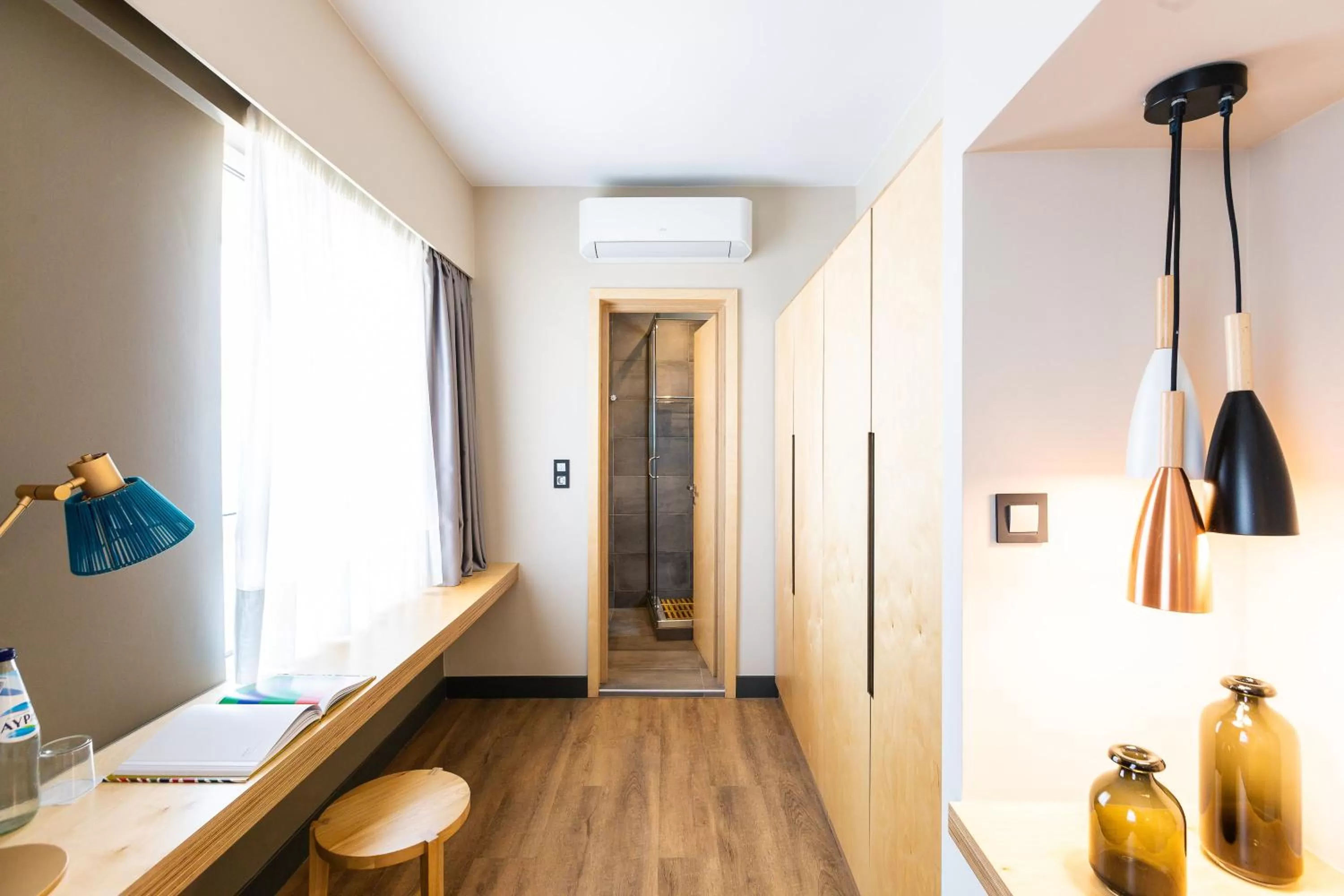 Communal lounge/ TV room in St. Bjur Suites