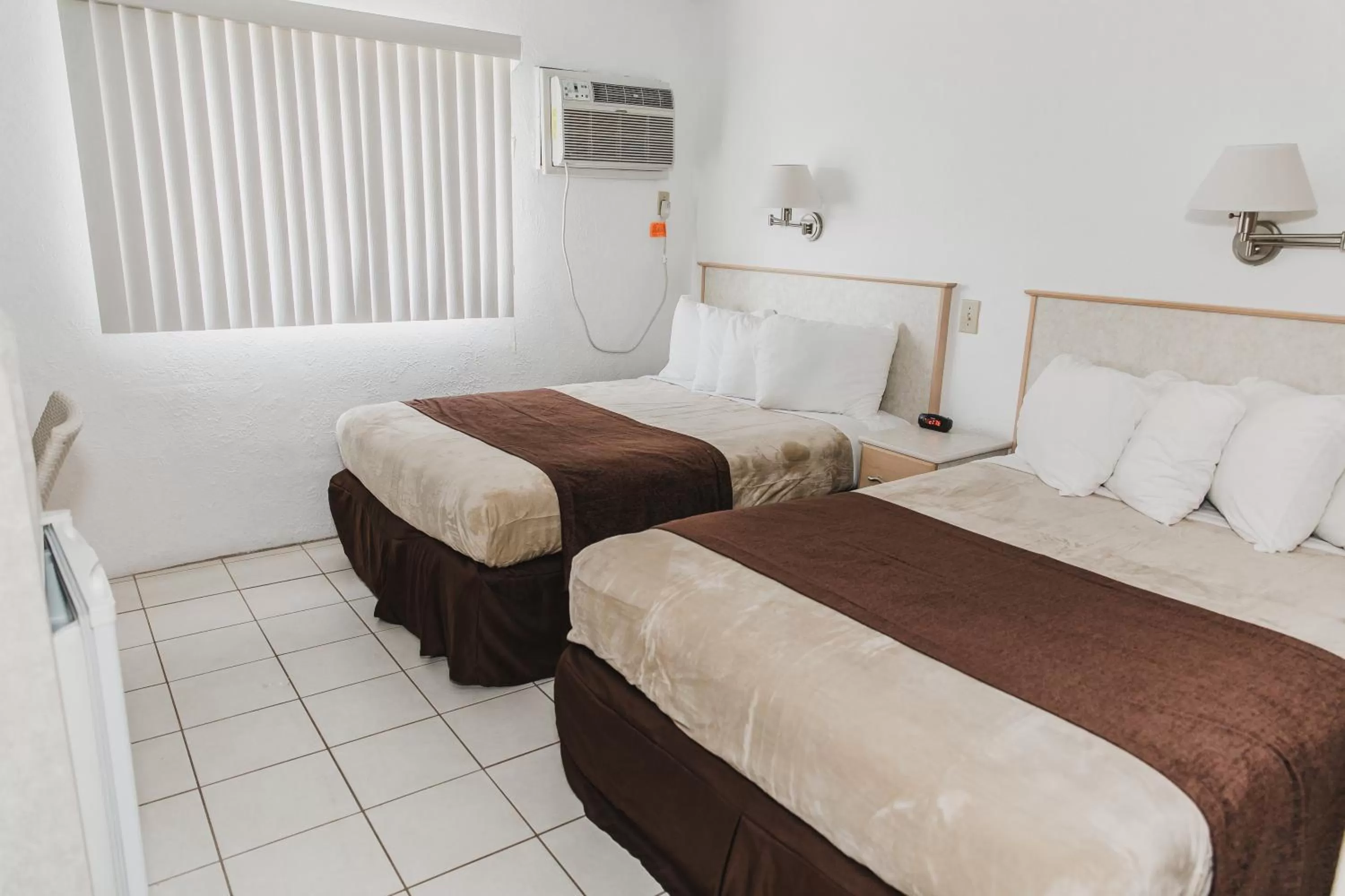 Bed in Heart of Wildwood Boardwalk Motel