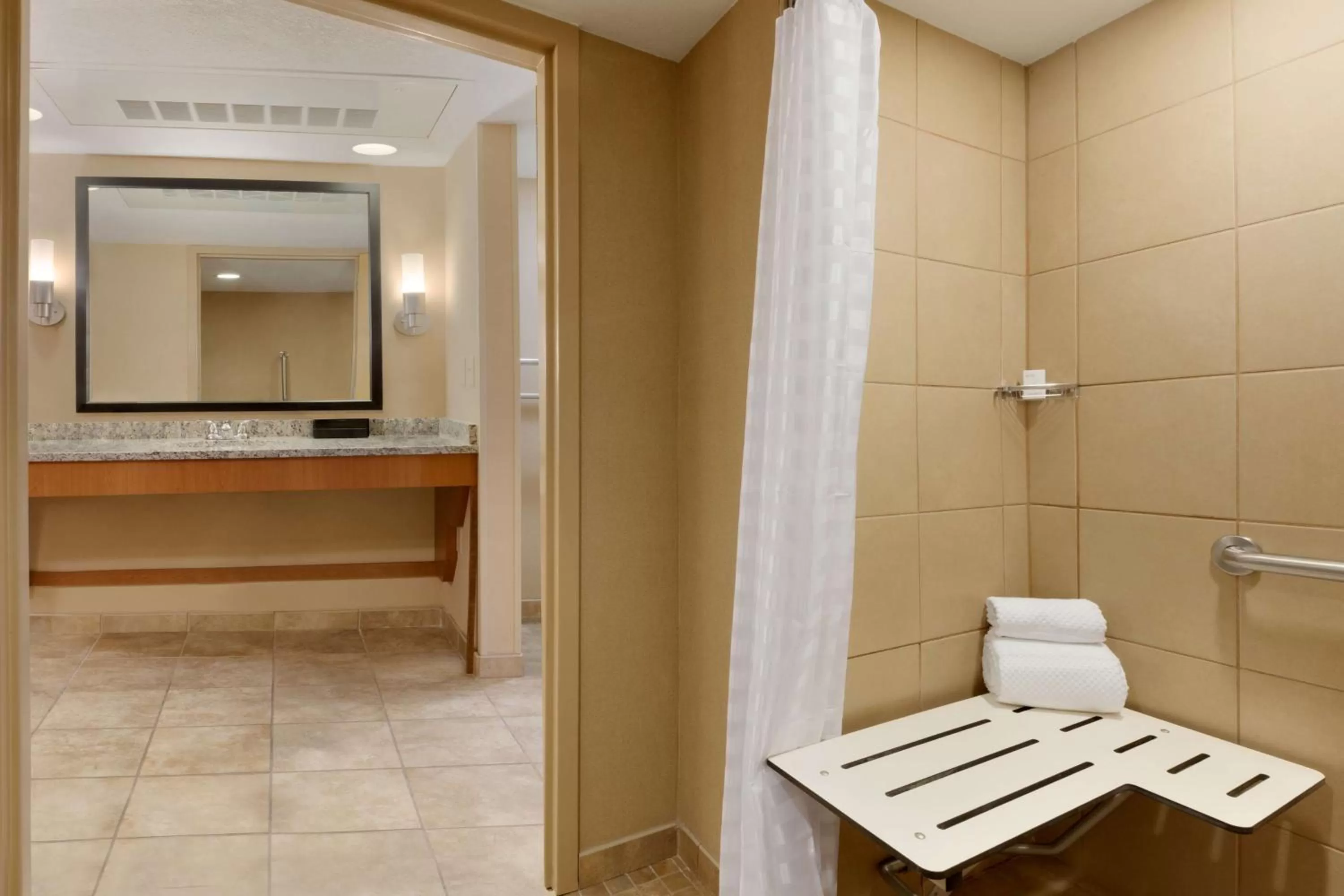 Bathroom in Embassy Suites by Hilton Kansas City International Airport
