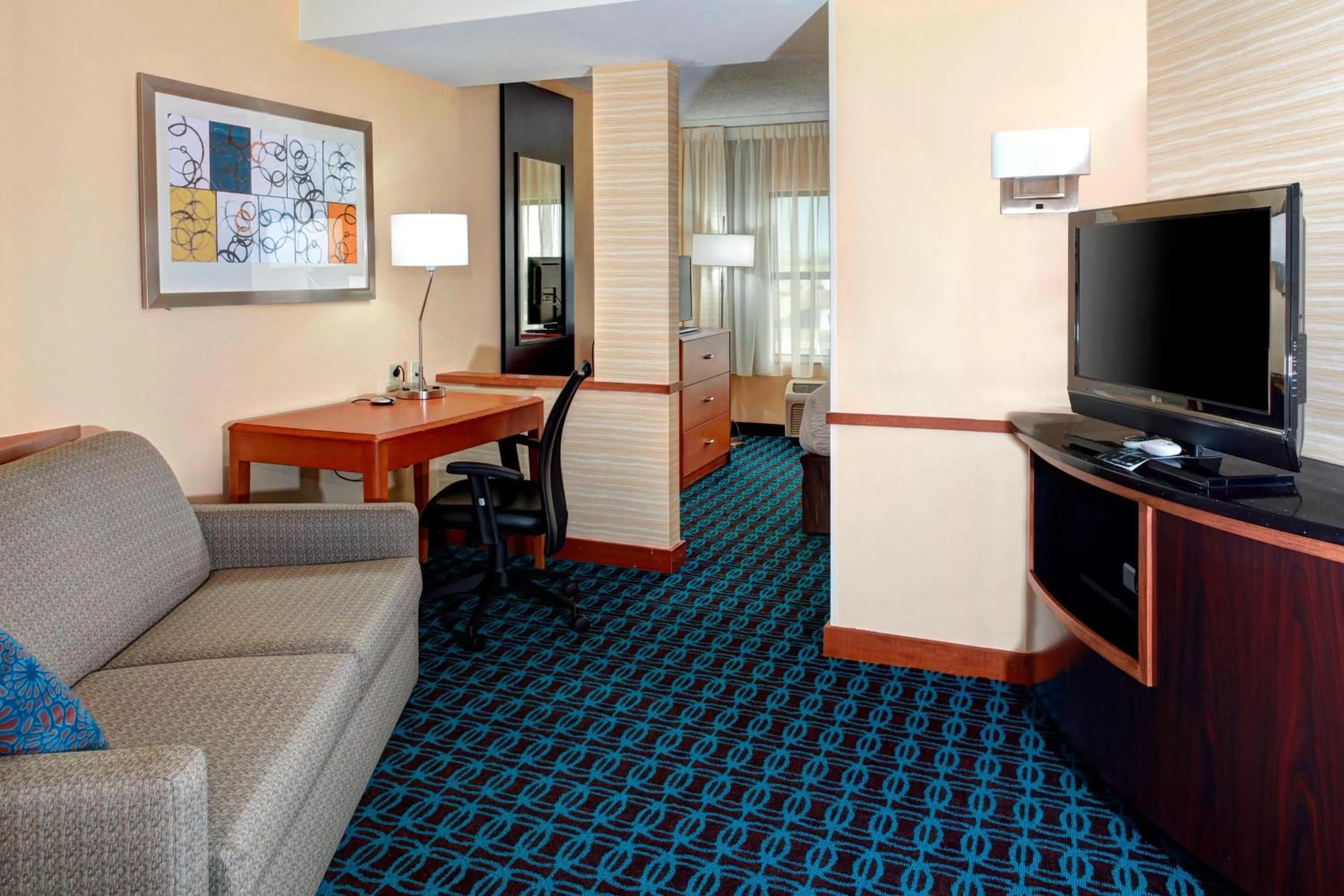 Living room in Fairfield by Marriott Inn & Suites Anniston Oxford
