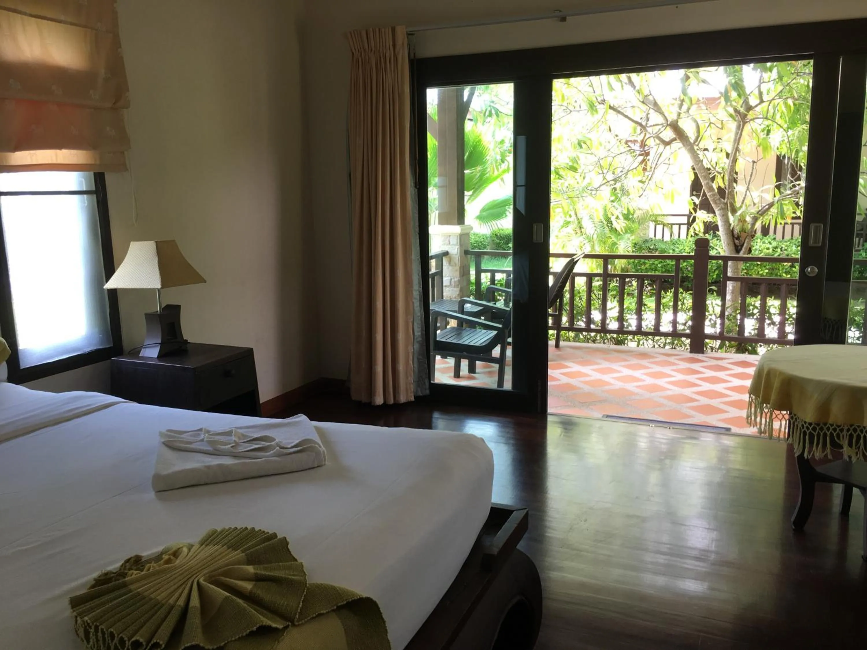 Balcony/Terrace, Bed in Grand Manita Beach Resort