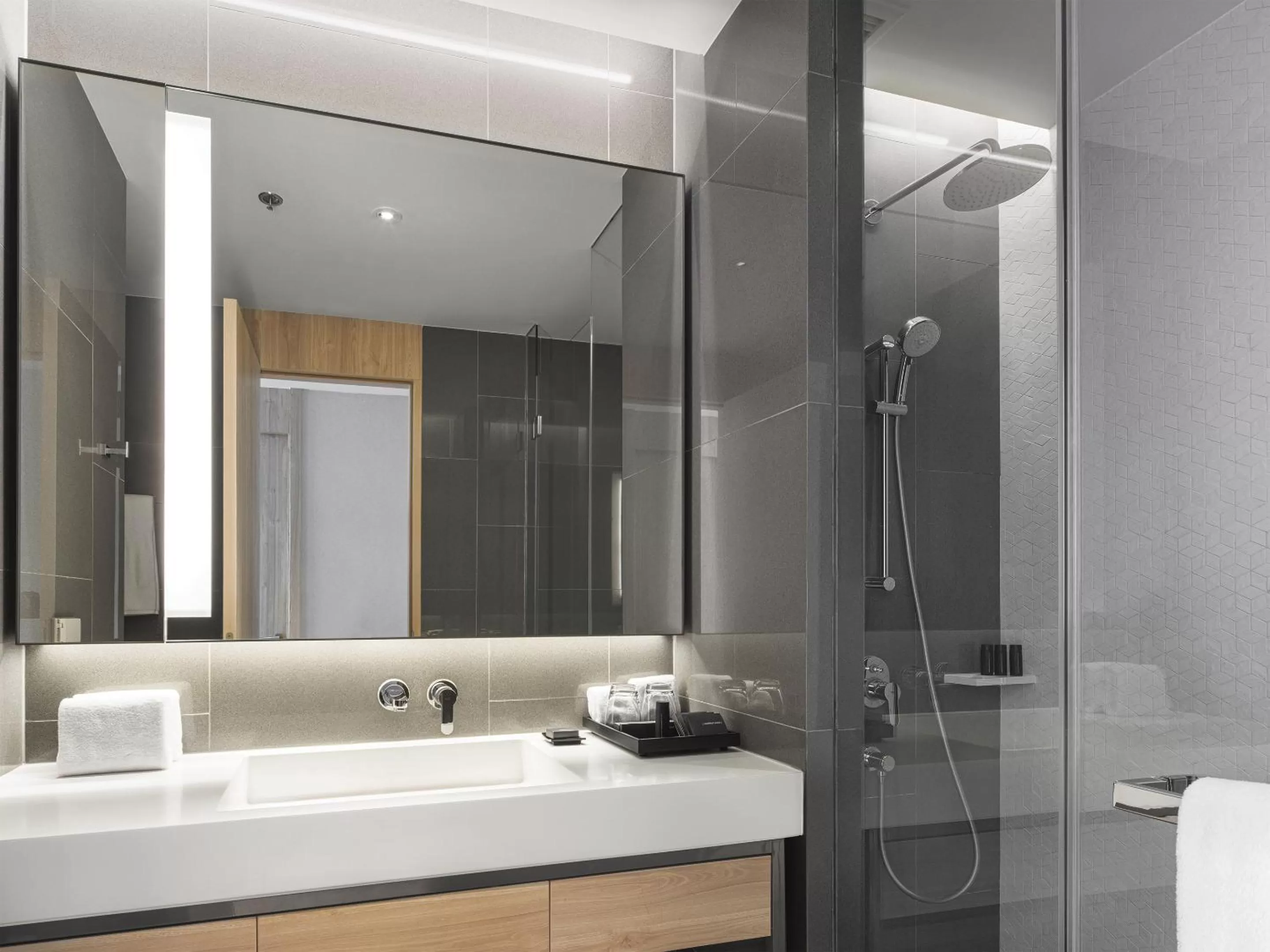 Shower in Oakwood Suites Bangkok