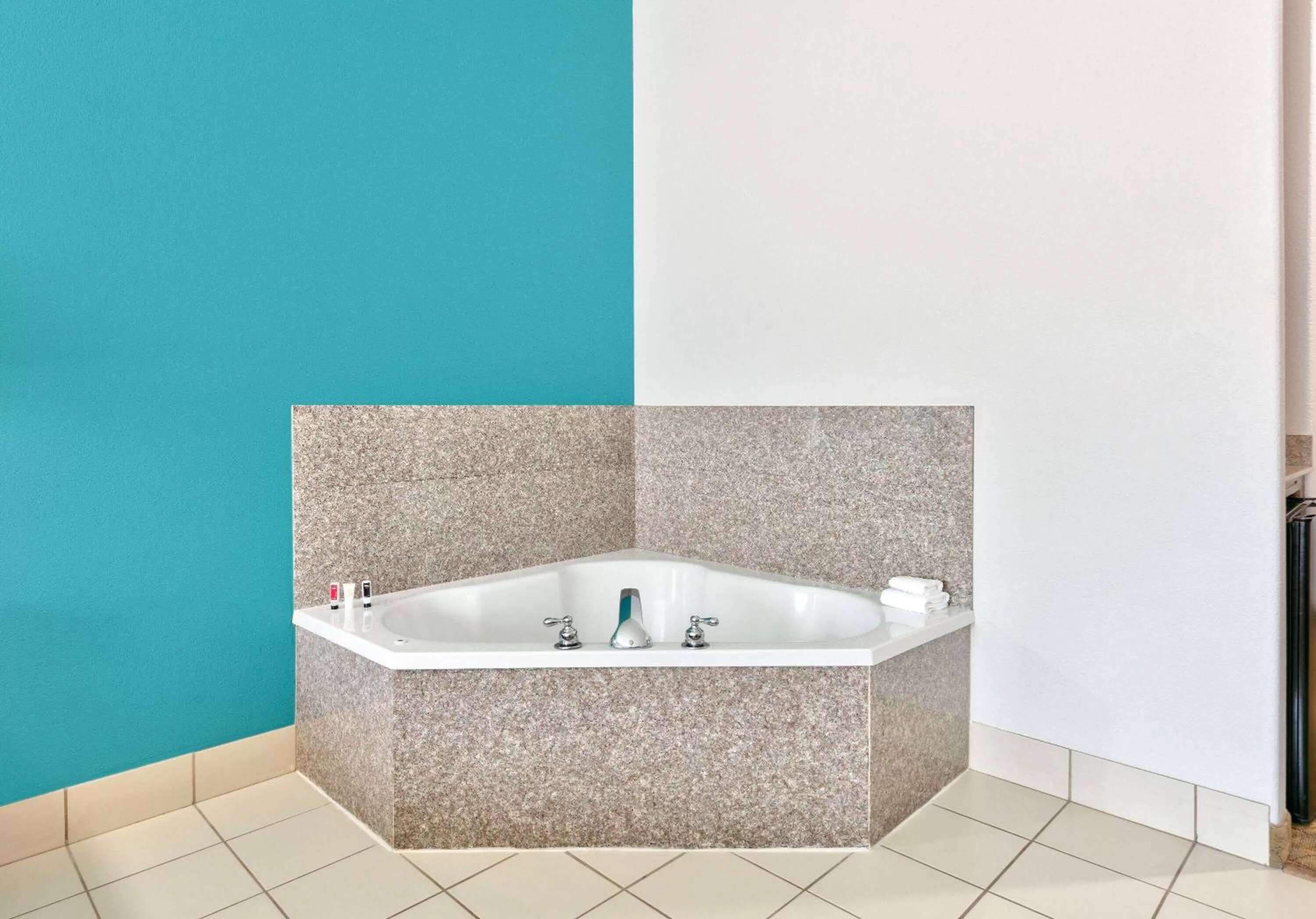 Bed in Baymont Inn & Suites by Wyndham Glen Rose